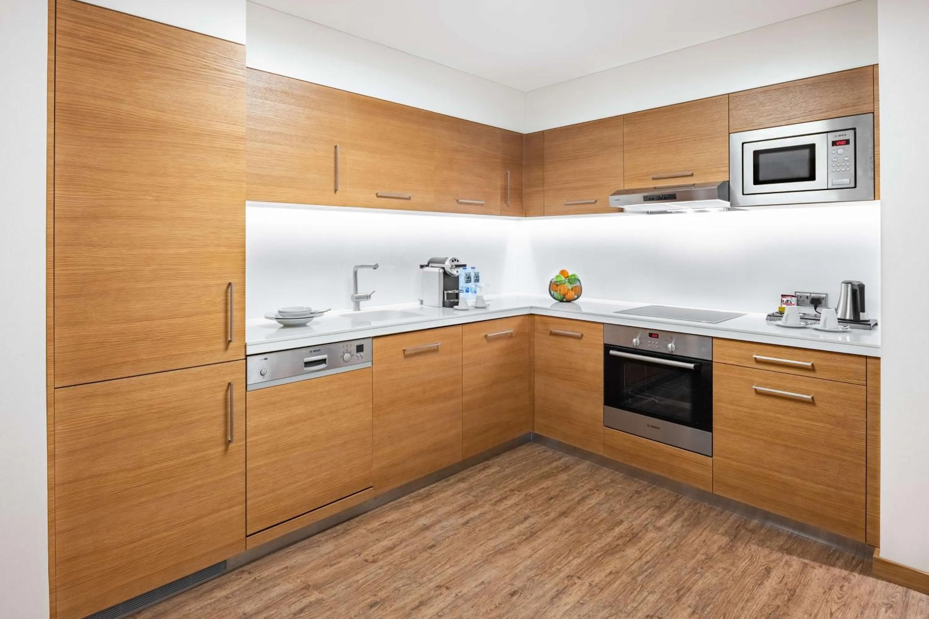 Kitchen or kitchenette in Radisson Blu Hotel & Residence, Riyadh Diplomatic Quarter