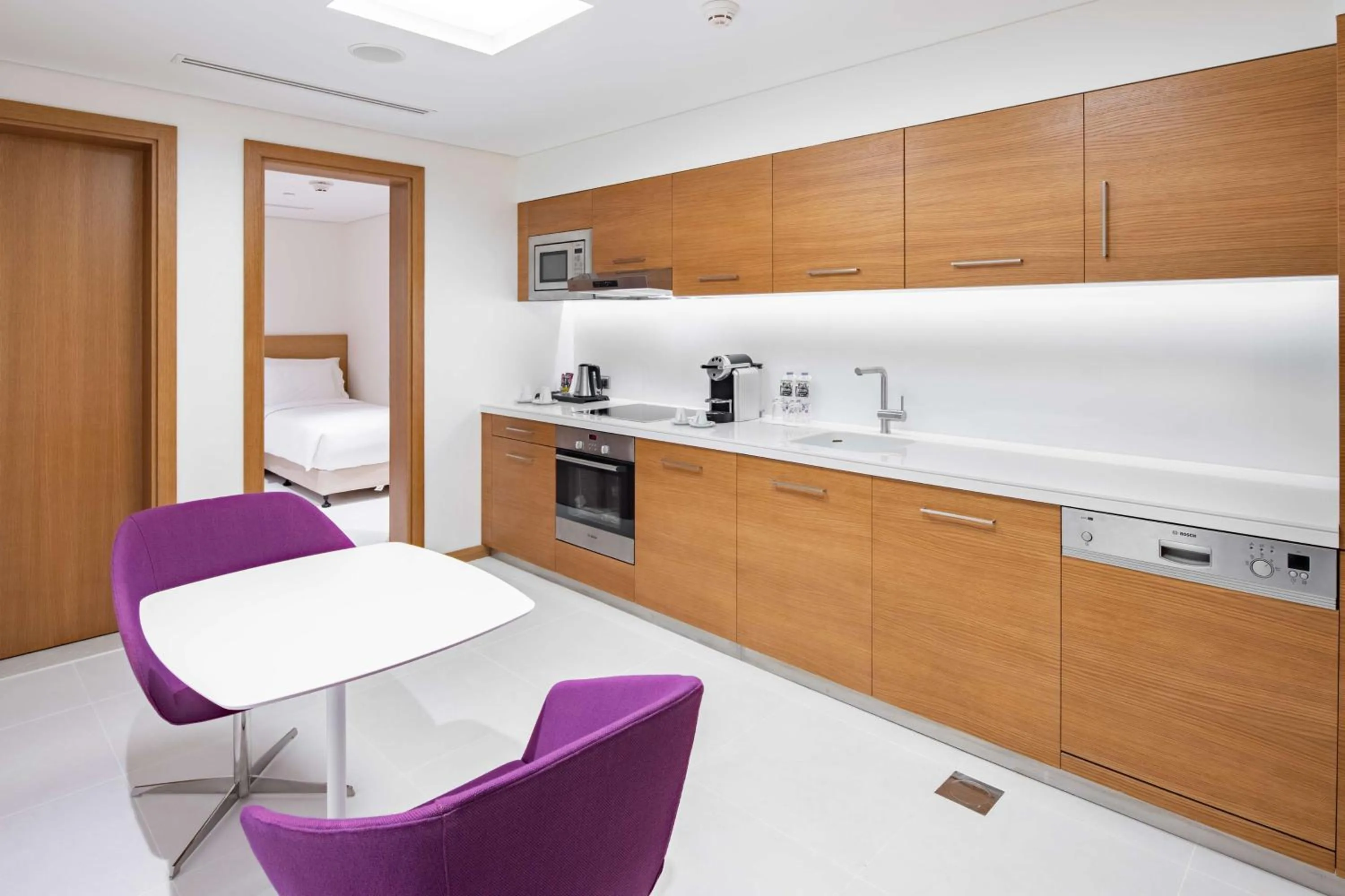 Kitchen or kitchenette in Radisson Blu Hotel & Residence, Riyadh Diplomatic Quarter