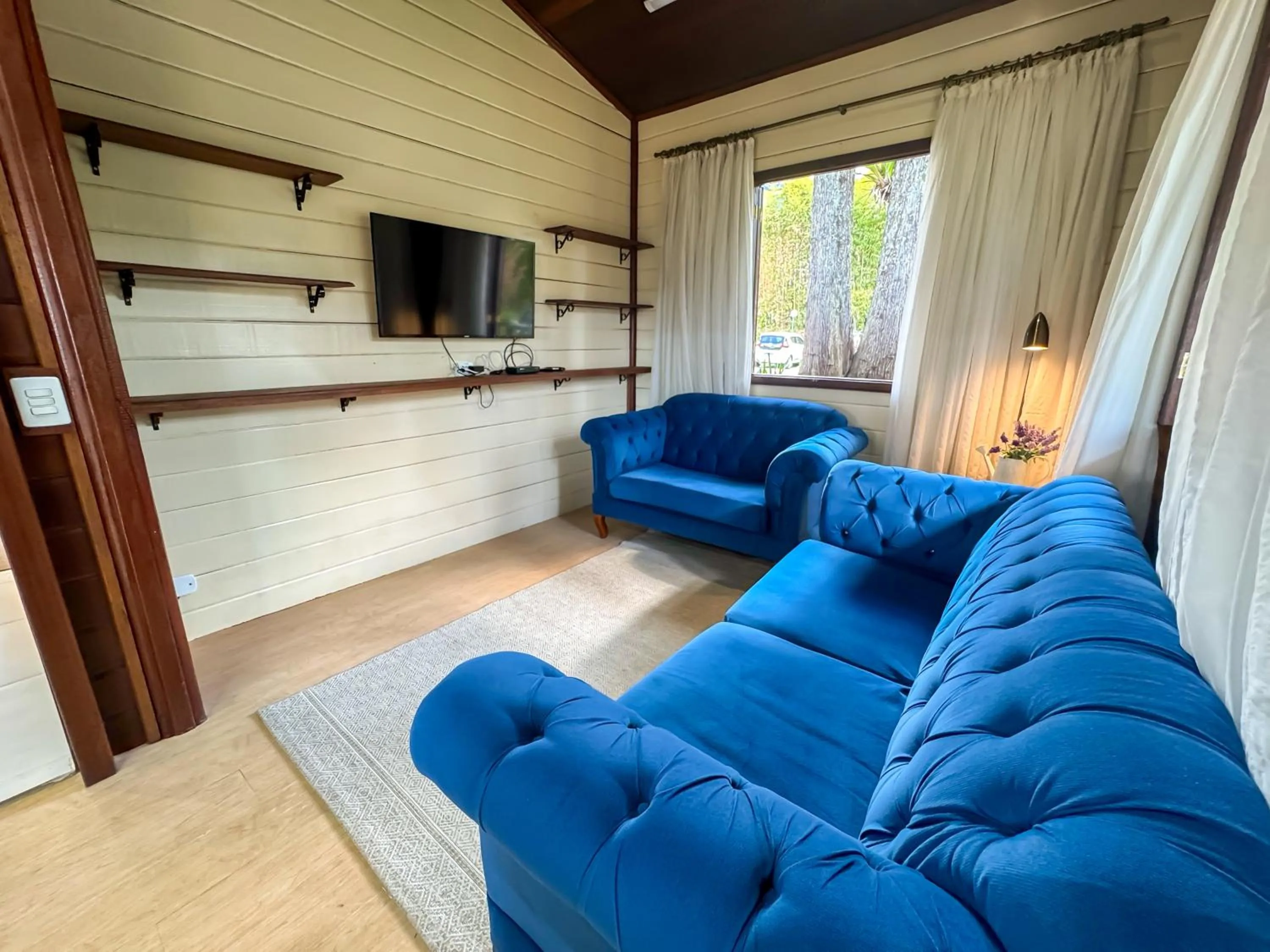 Seating area in Hotel Nacional Inn Campos do Jordão