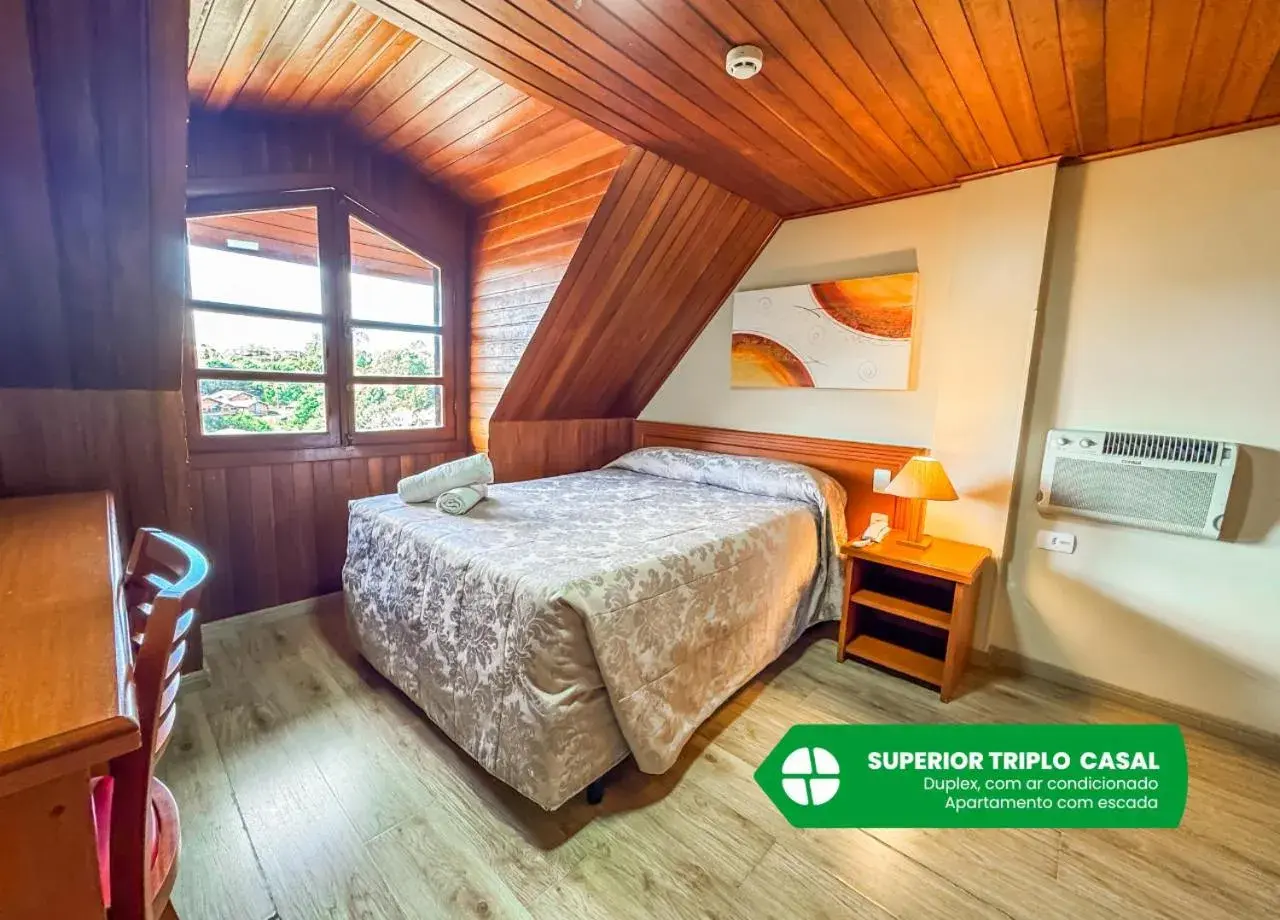 Superior Triple Room with Double Bed in Hotel Nacional Inn Campos do Jordão Superior Triple Room with Double Bed in Hotel Nacional Inn Campos do Jordão