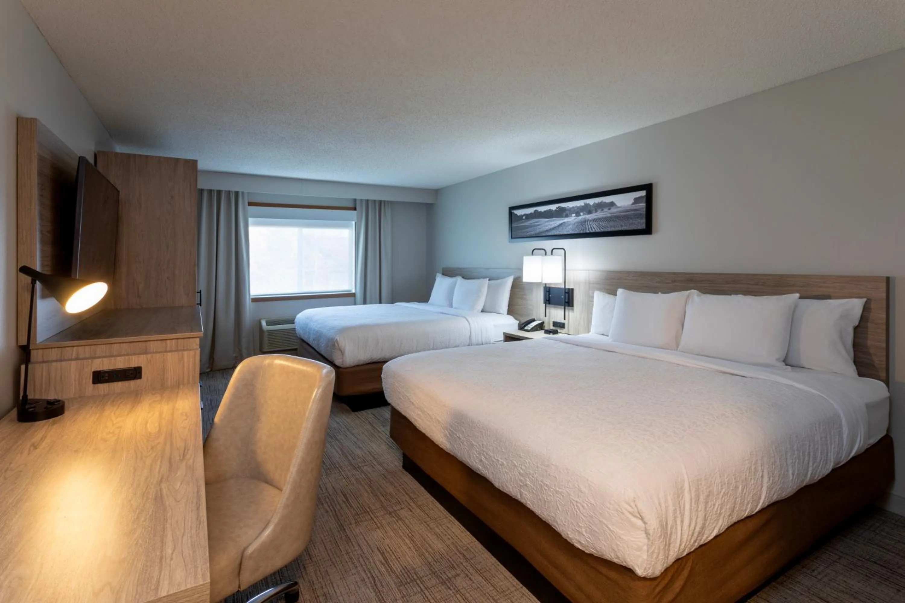 Bed in GrandStay Hotel & Suites