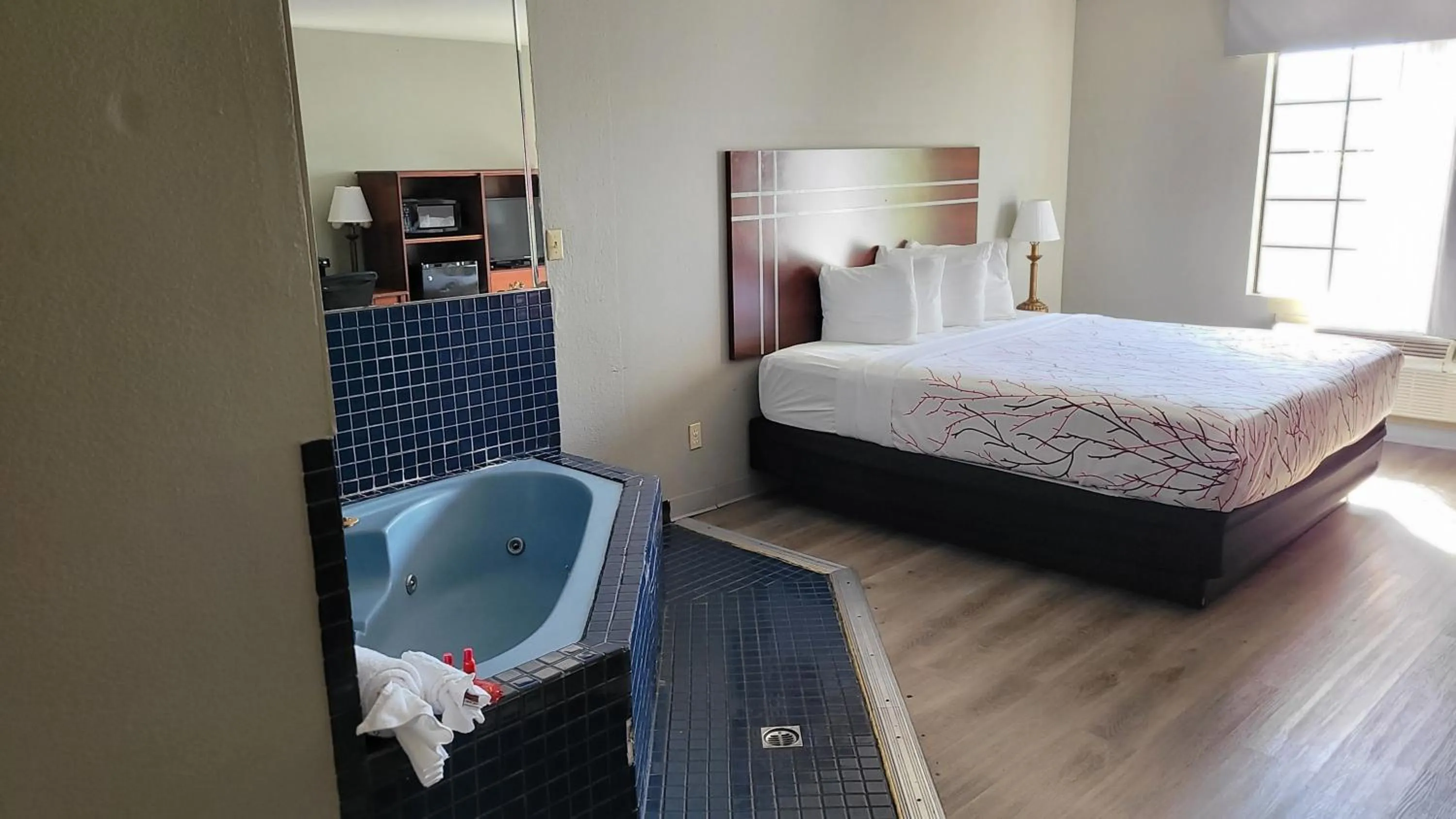 Bed in Rancho San Diego Inn & Suites