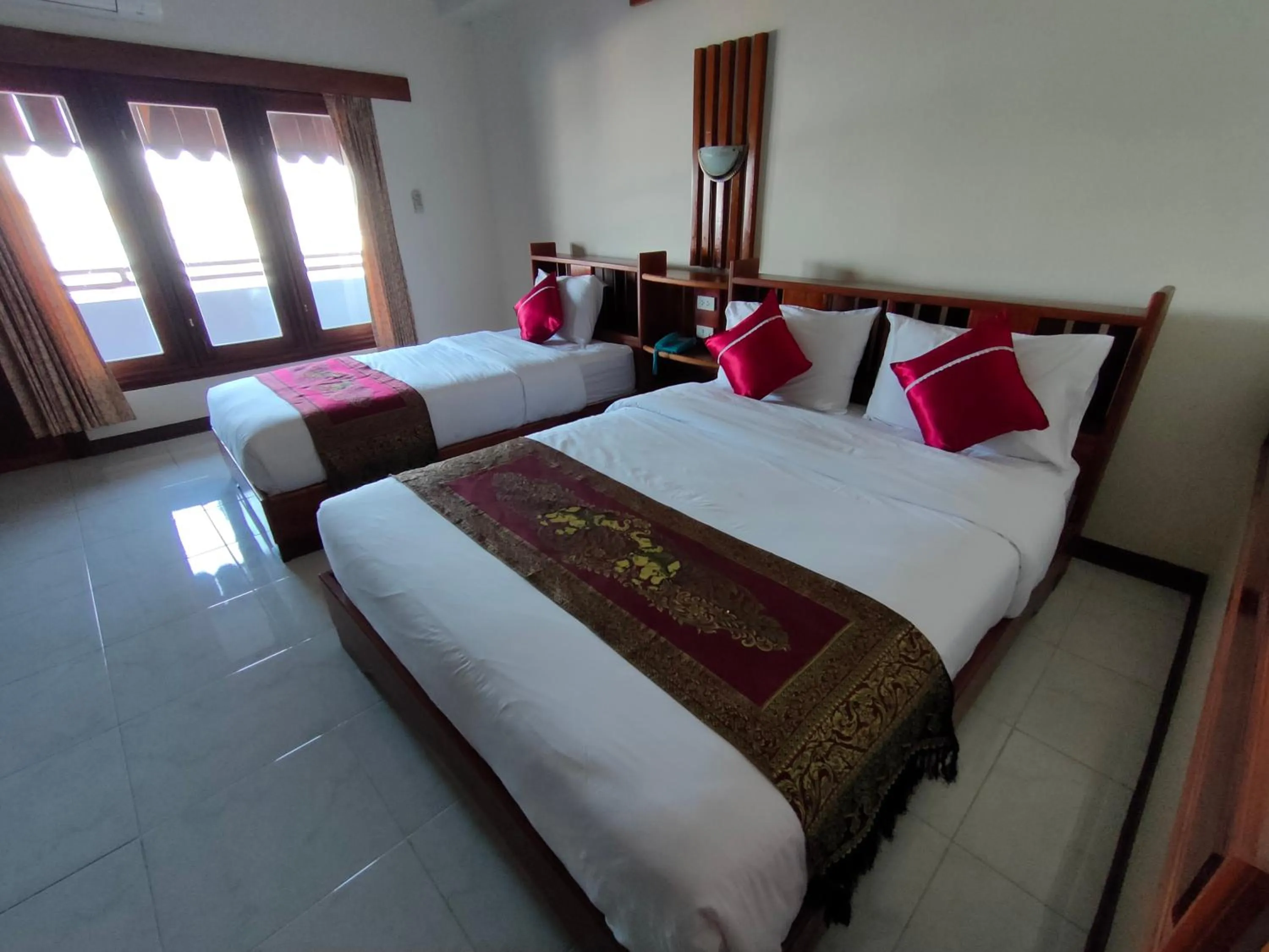 Bed in Riverfront Hotel Mukdahan