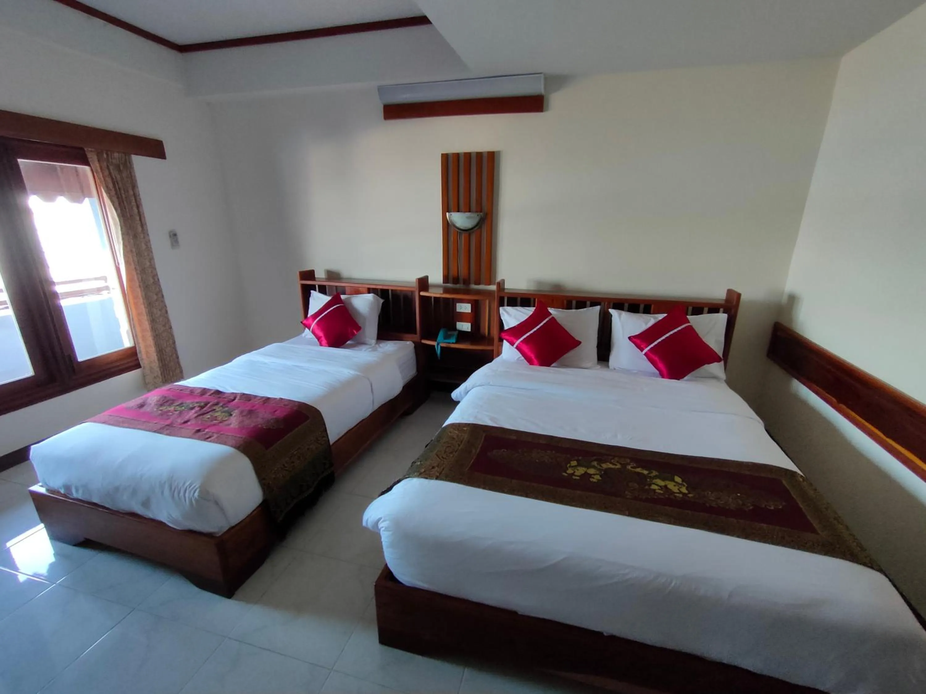 Bed in Riverfront Hotel Mukdahan