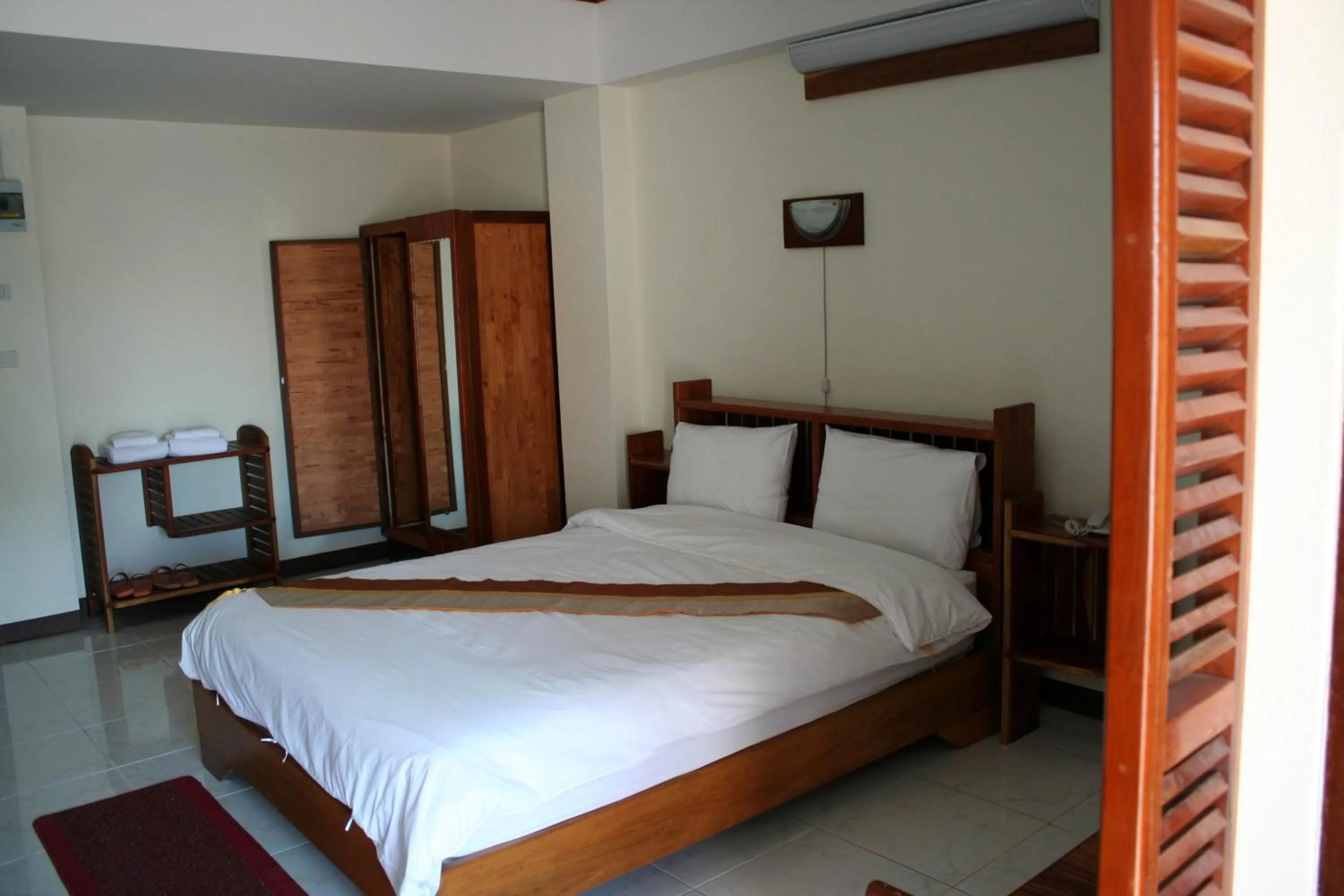 Bed in Riverfront Hotel Mukdahan