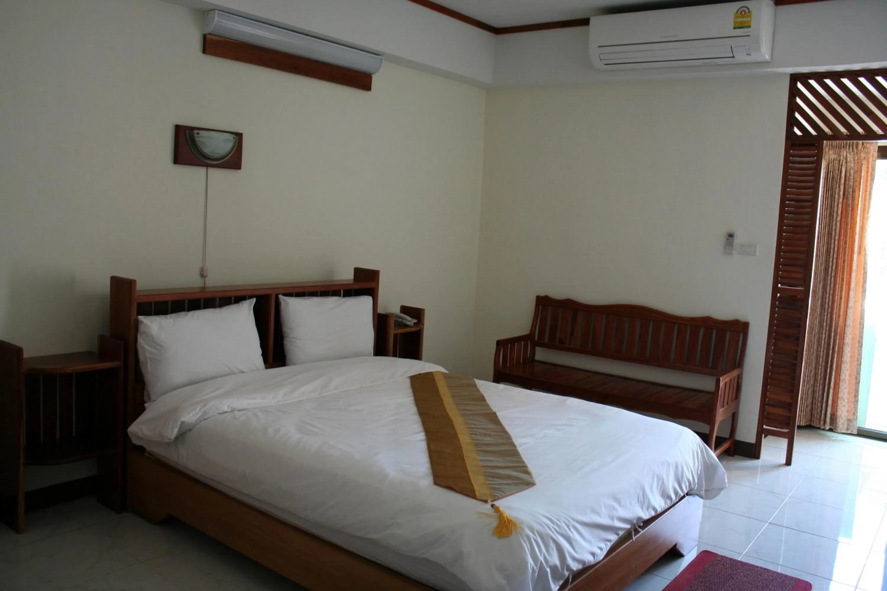 Bed in Riverfront Hotel Mukdahan