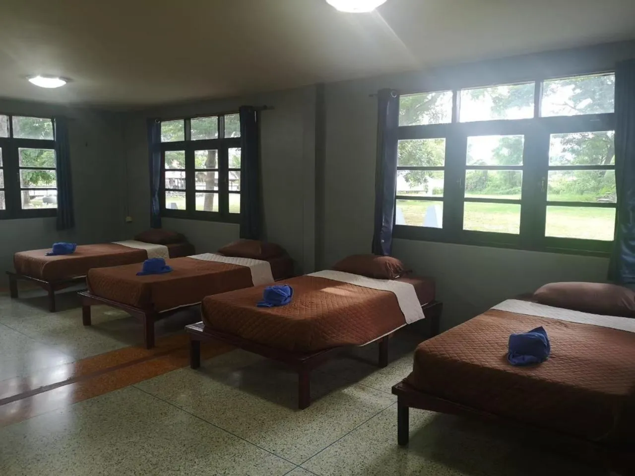 Bed in Buasawan Resort & Restaurant