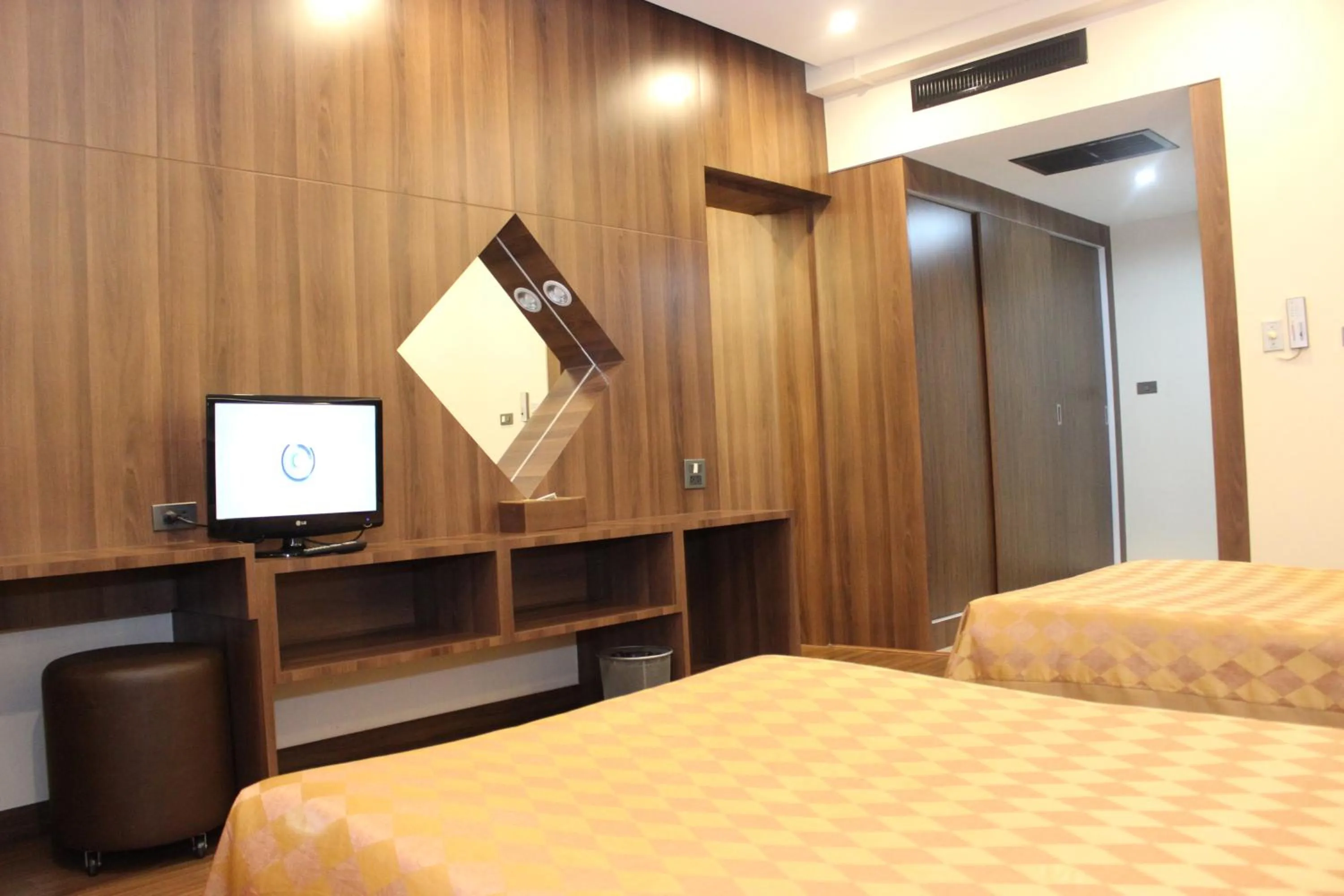 Bed in Charoen Hotel