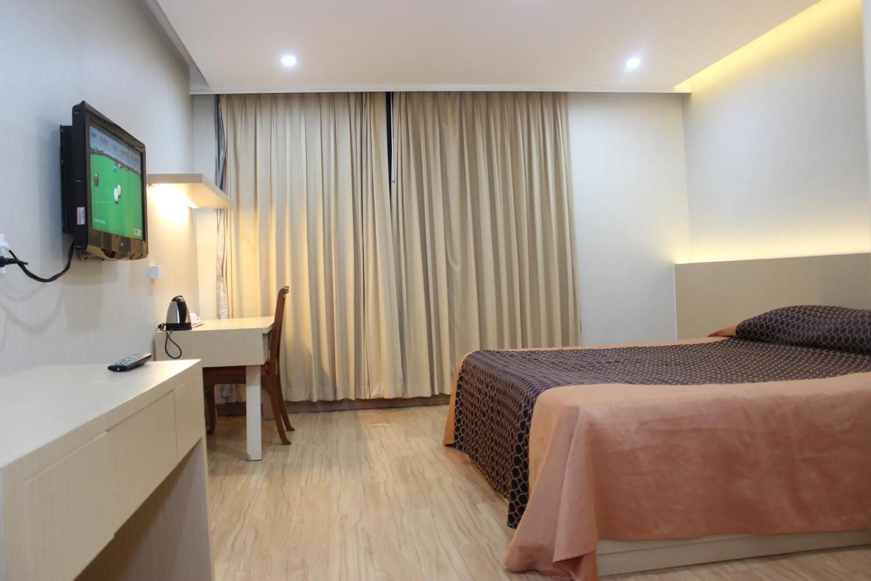 Bed in Charoen Hotel