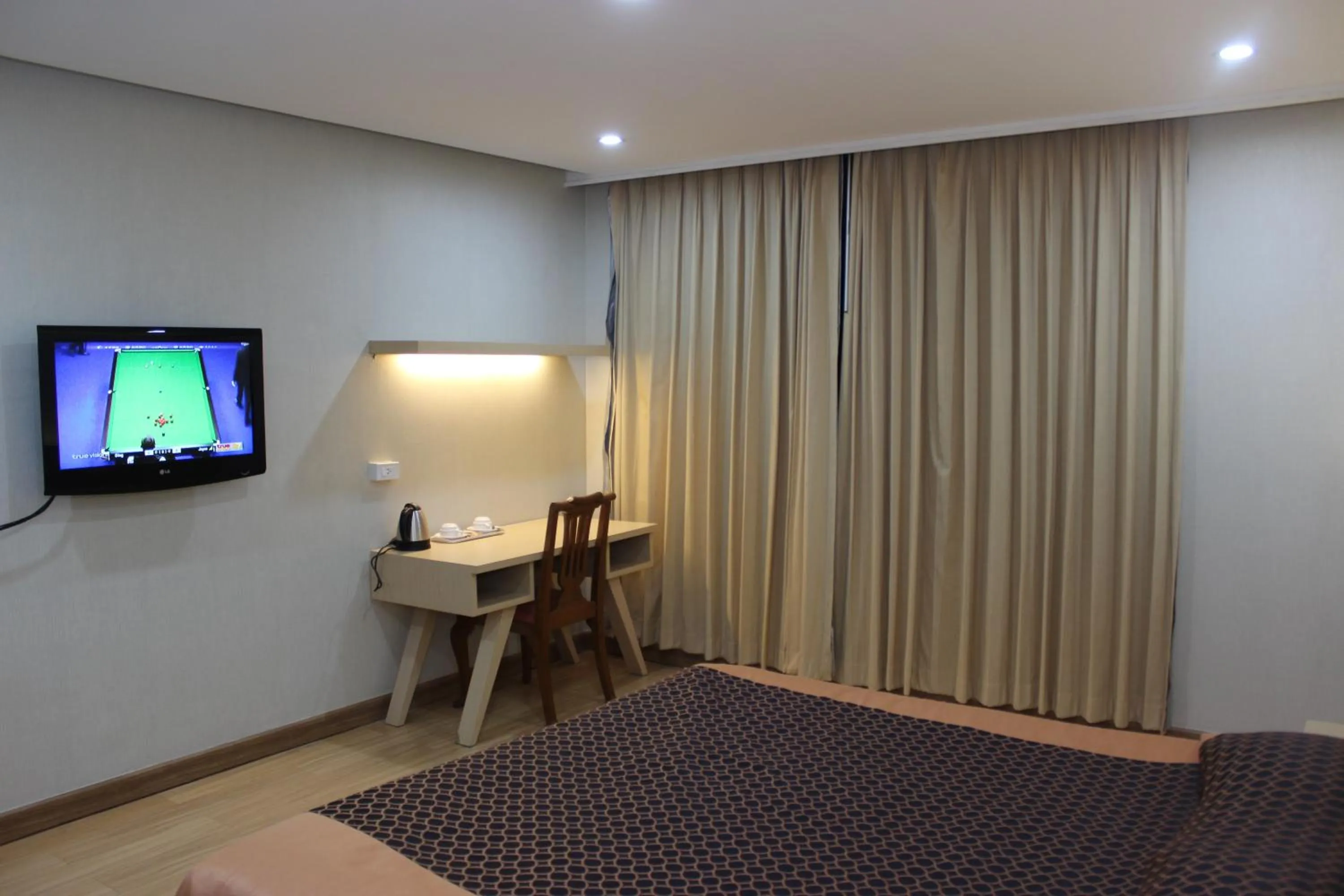 Bed in Charoen Hotel