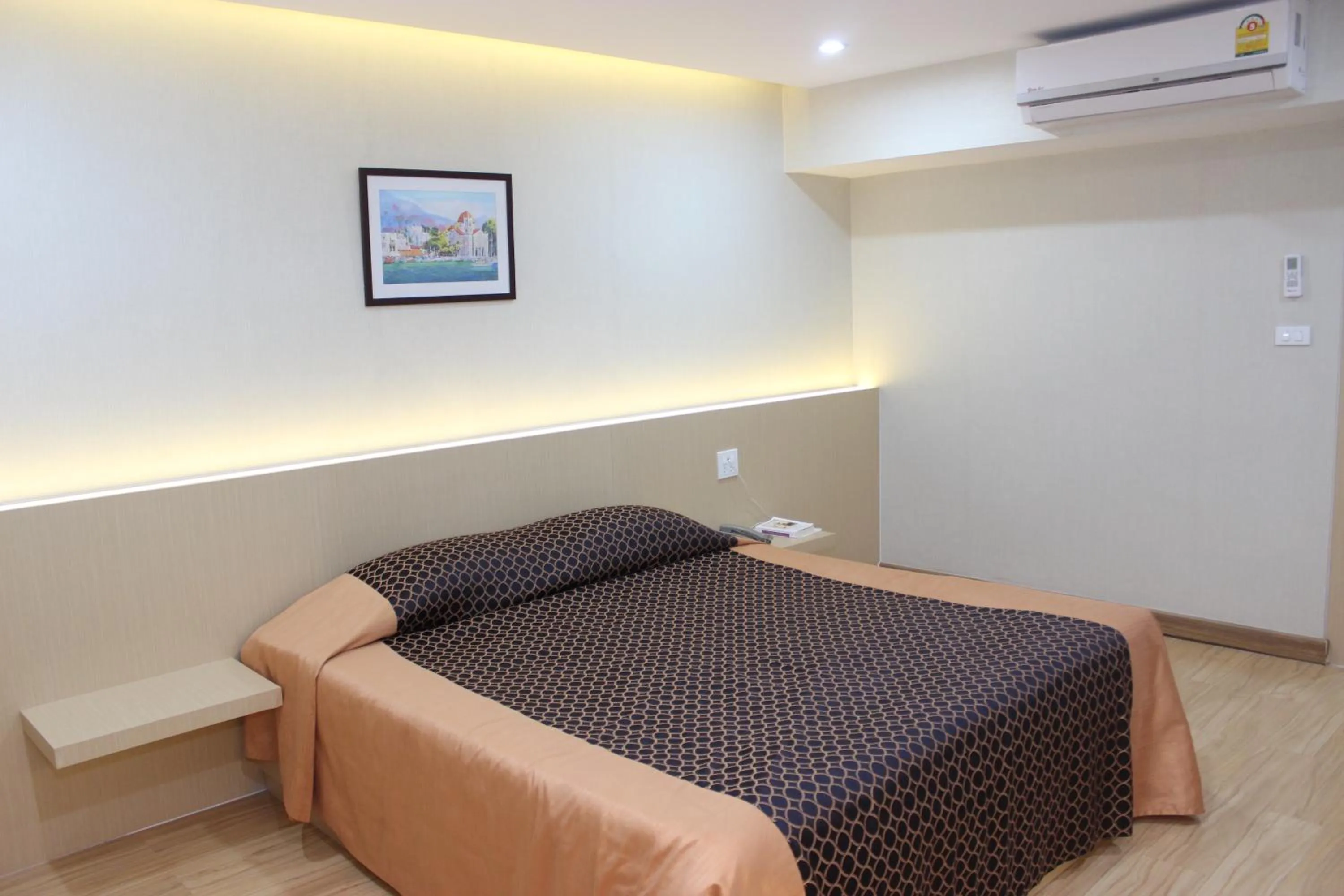 Bed in Charoen Hotel