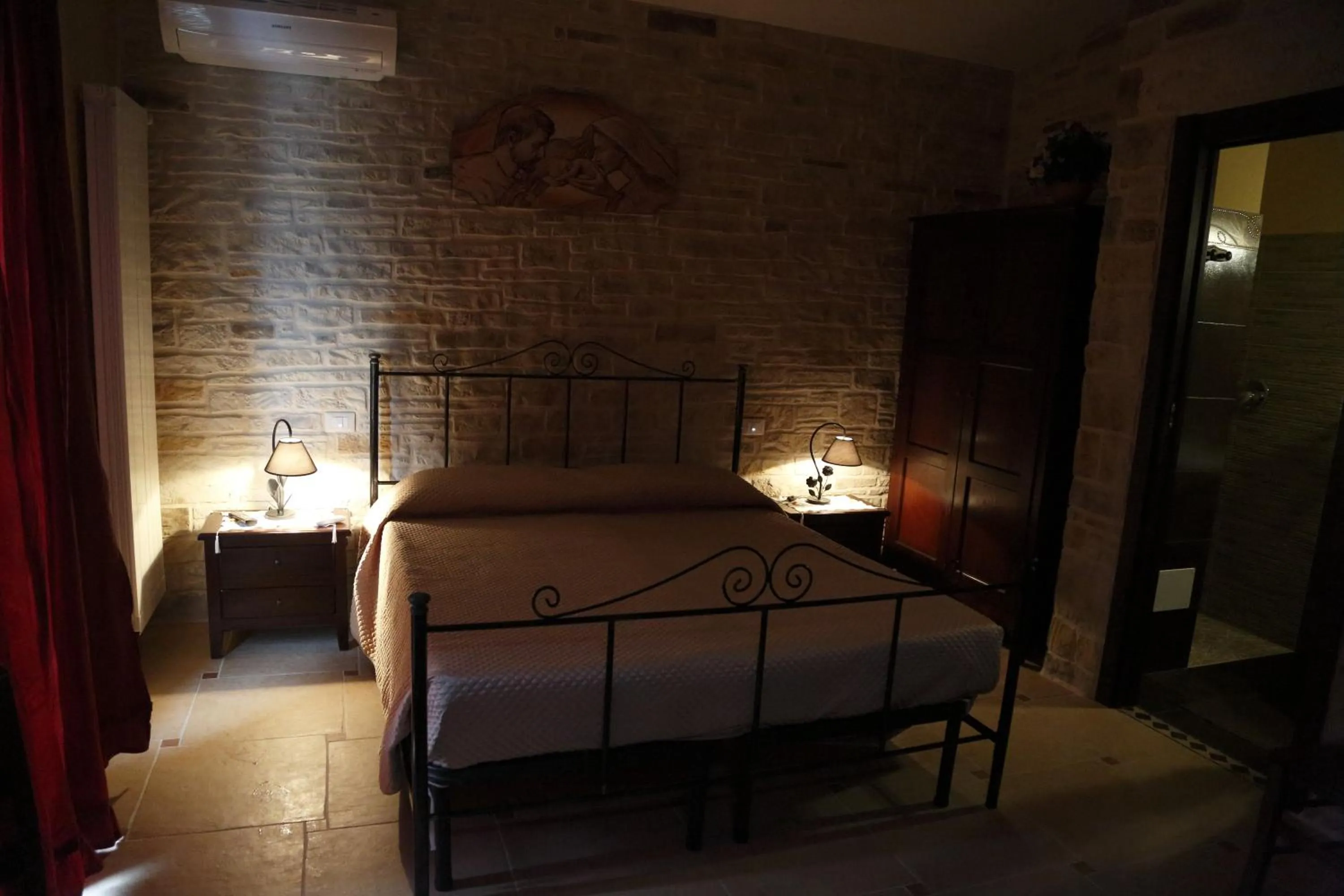 Photo of the whole room, Bed in Il Quadrifoglio