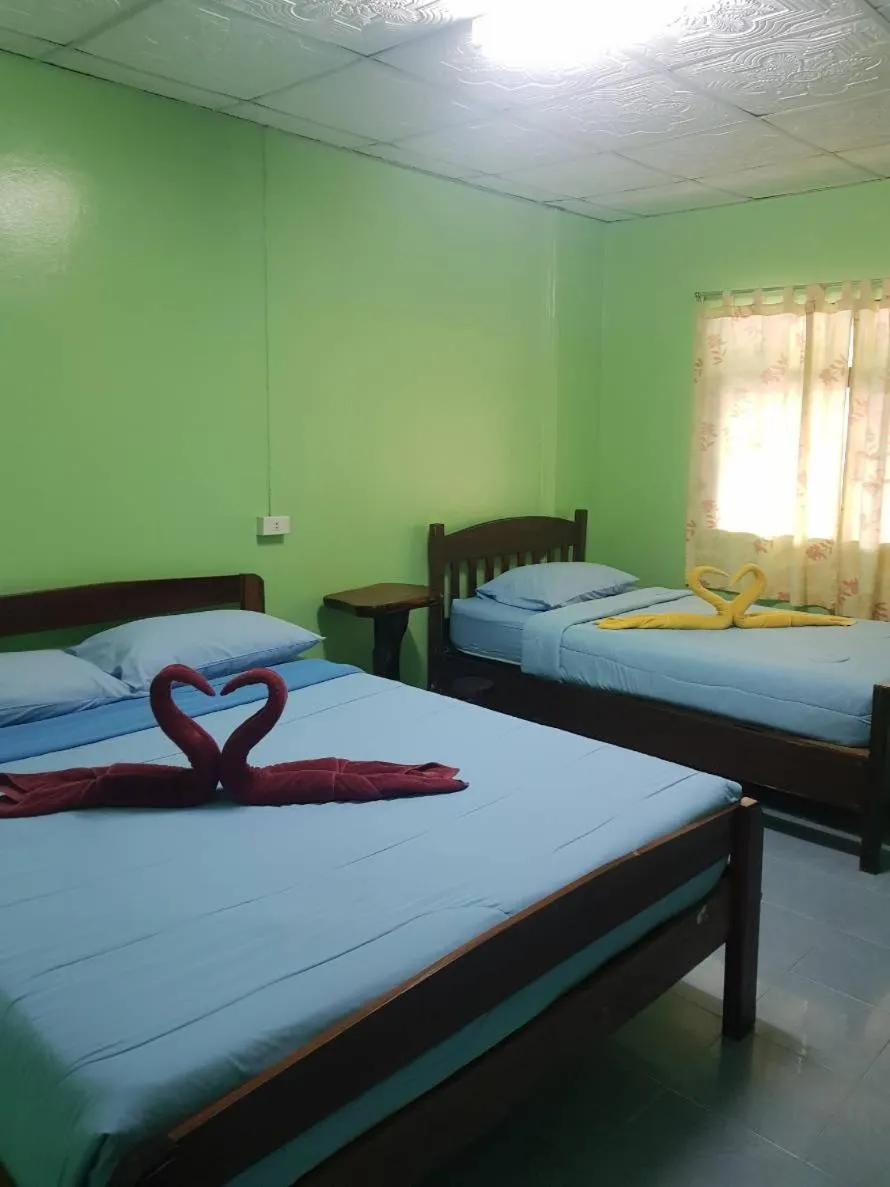 Bed in Rin Beach Resort