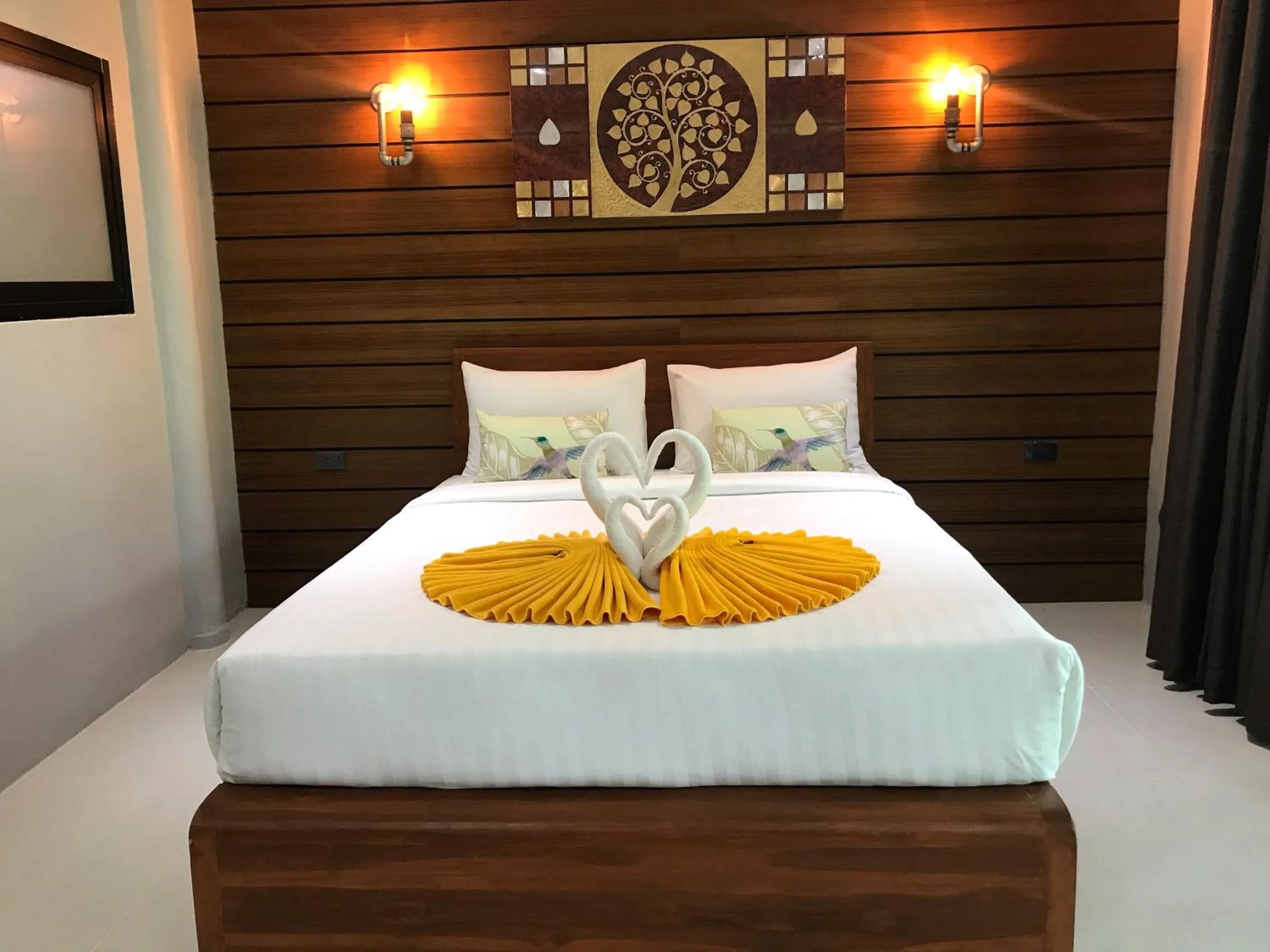Bed in Rin Beach Resort