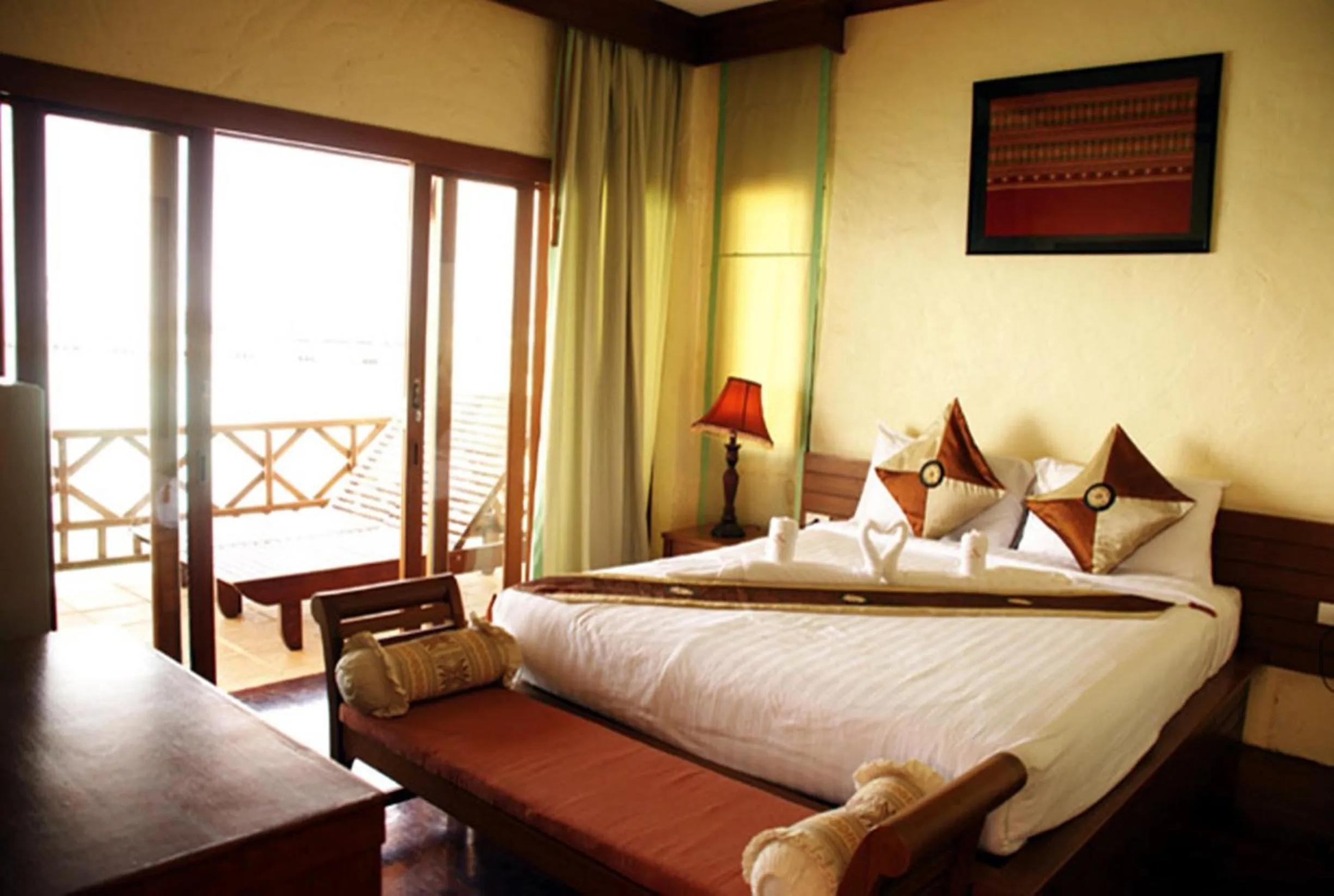 Bed in Rin Beach Resort