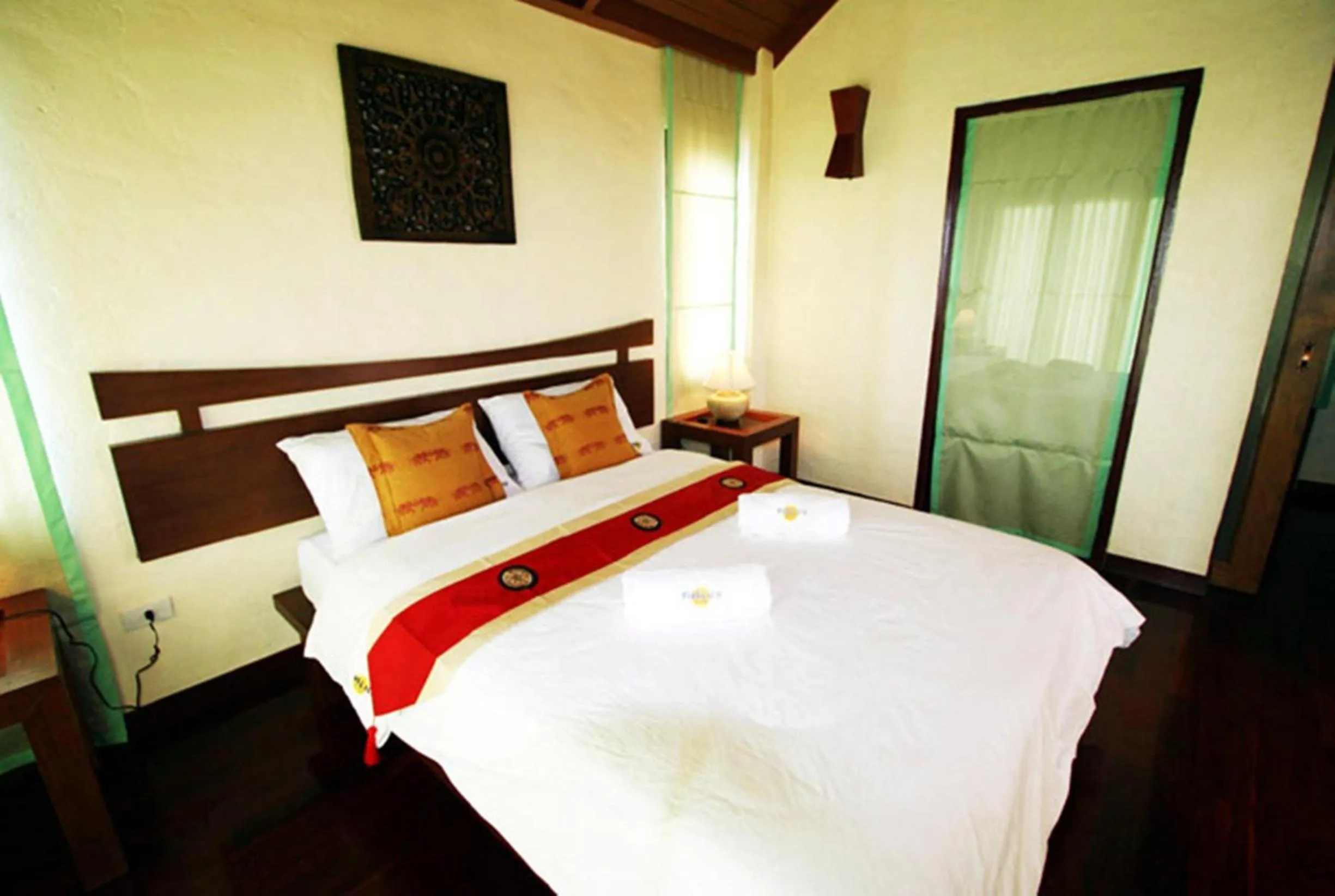 Bed in Rin Beach Resort