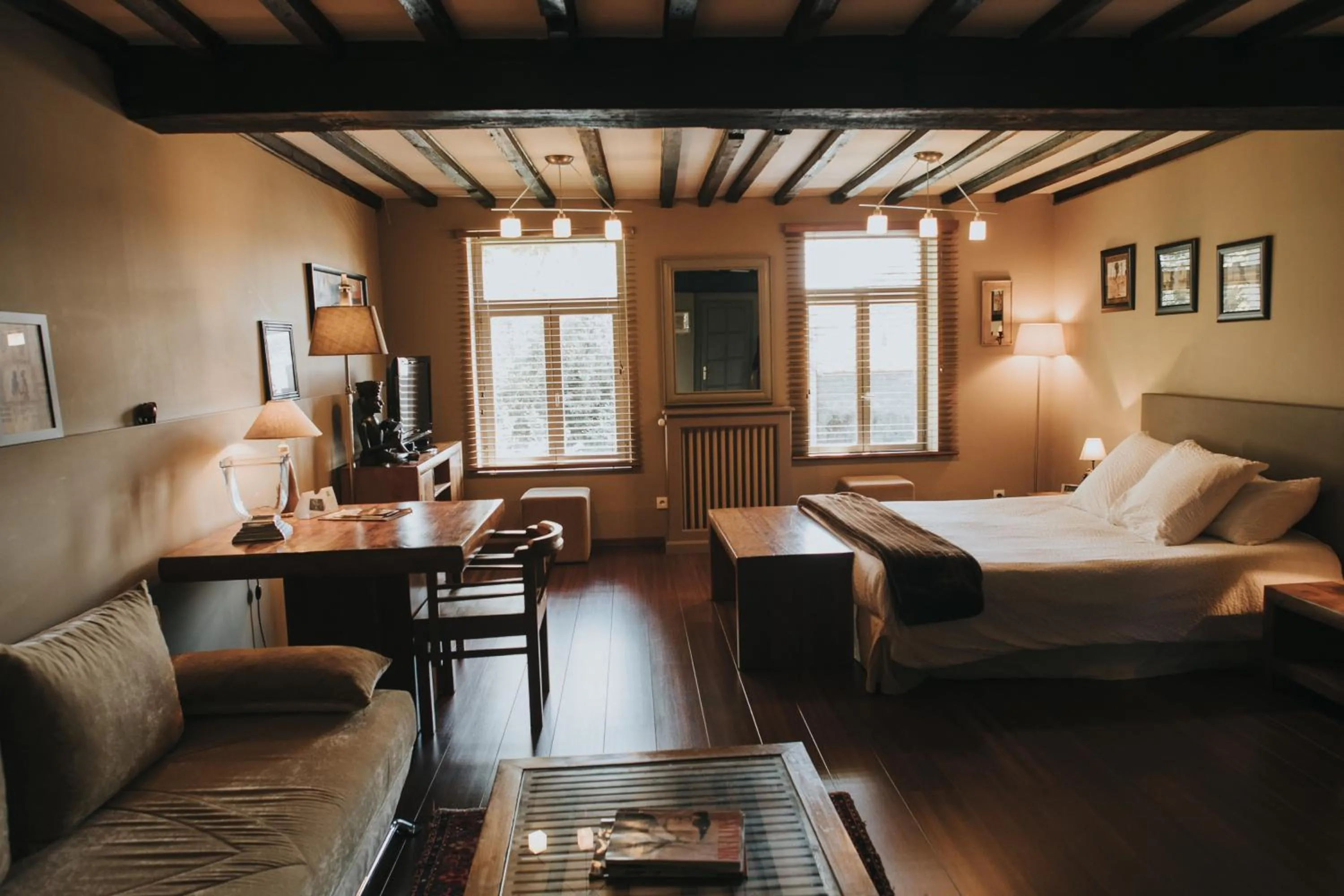 Bed in LOGIS HÔTEL-RESTAURANT - Le Moulin d'Artres