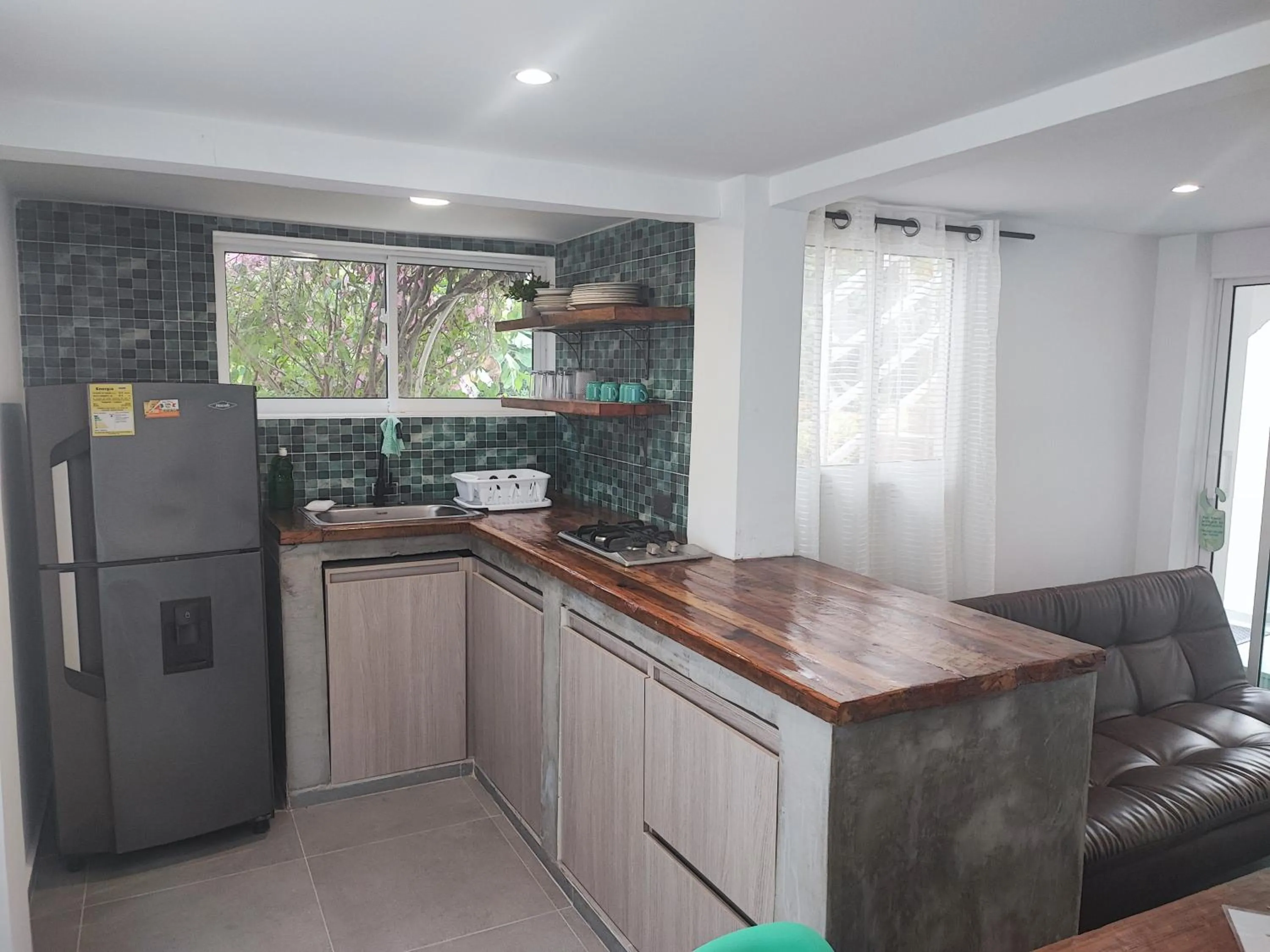 kitchen in Cabañas Green Yard