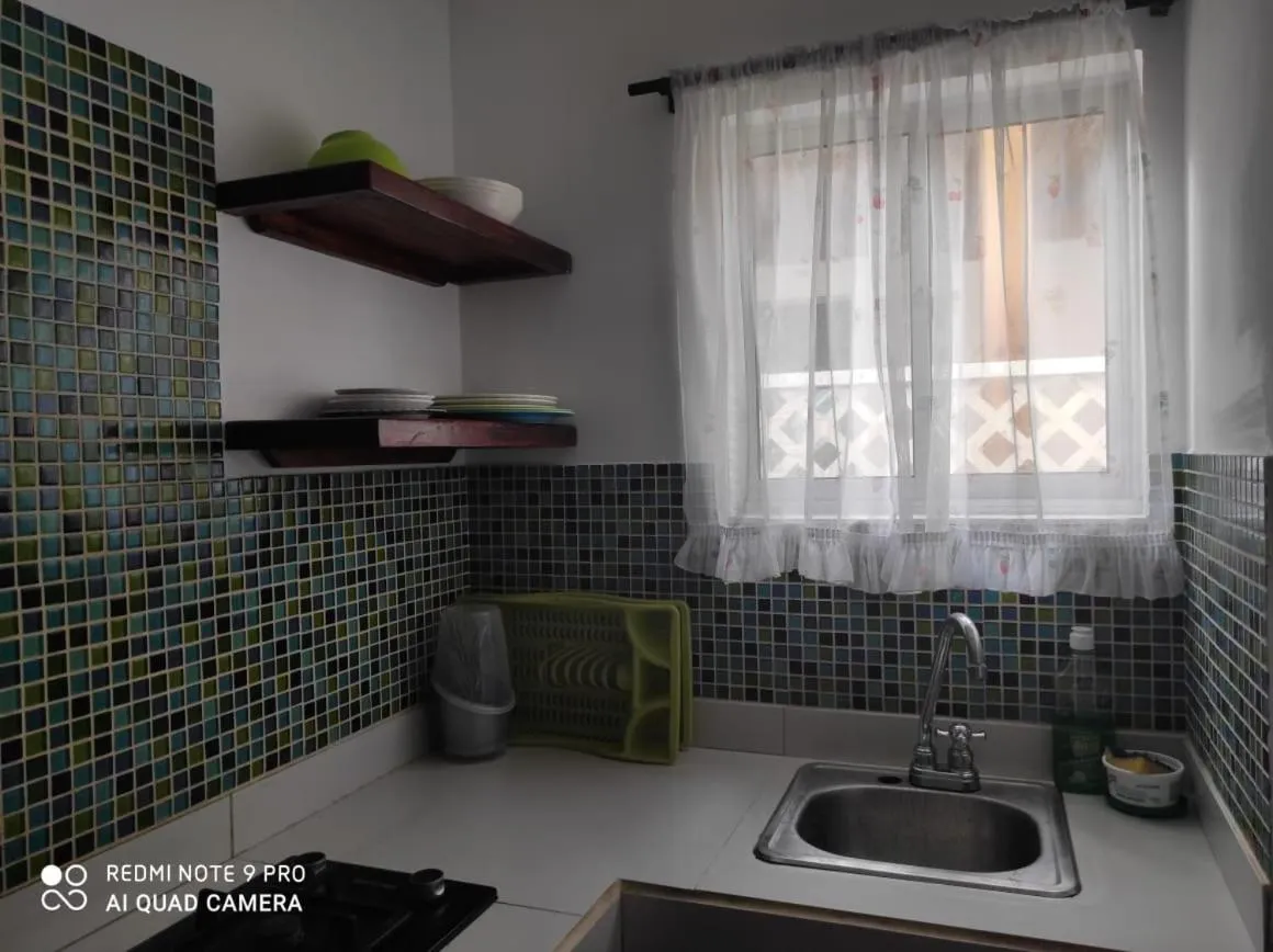 kitchen in Cabañas Green Yard