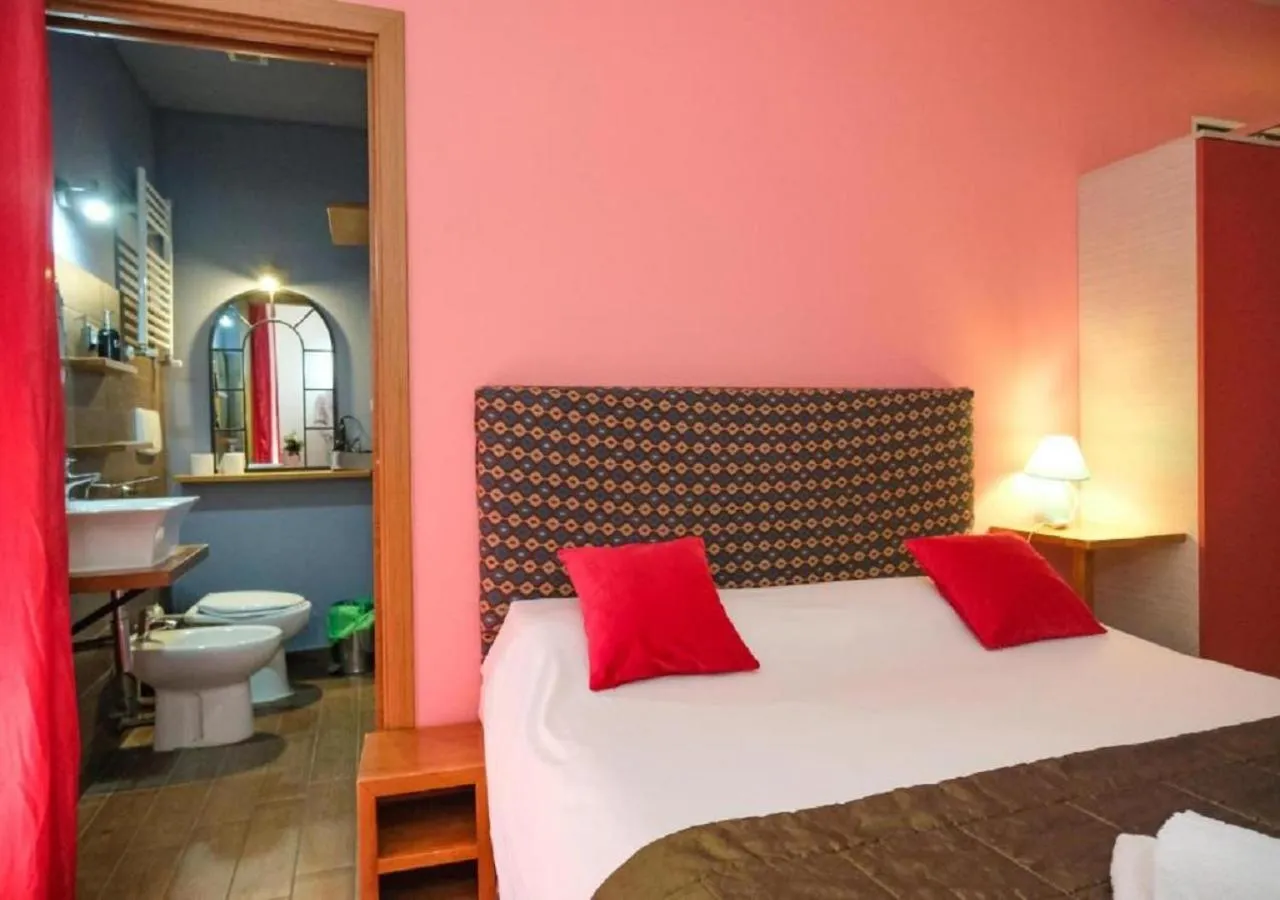 Toilet, Bed in Aida Charming Rooms