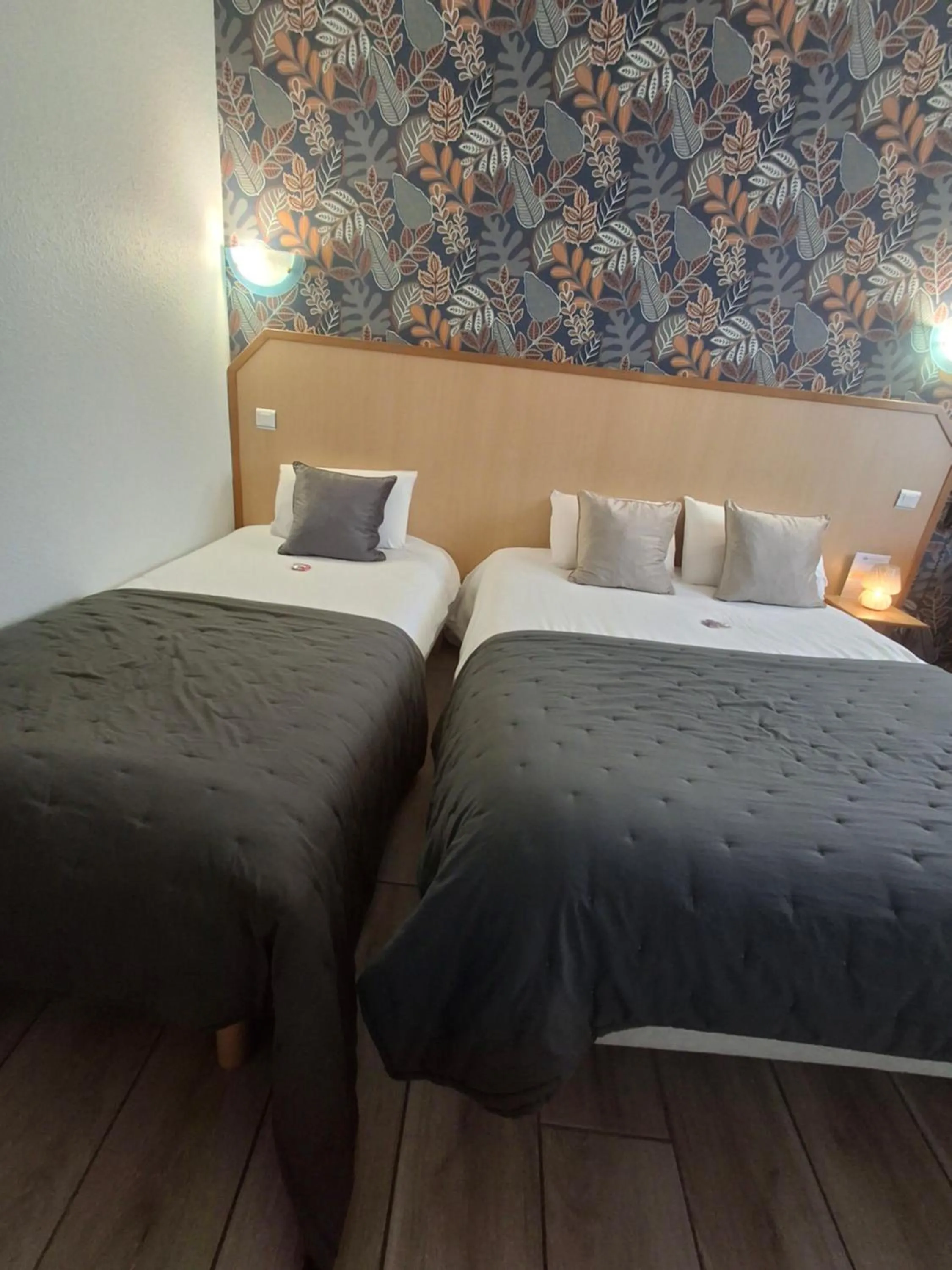 Bed in Hôtel Le Laury's