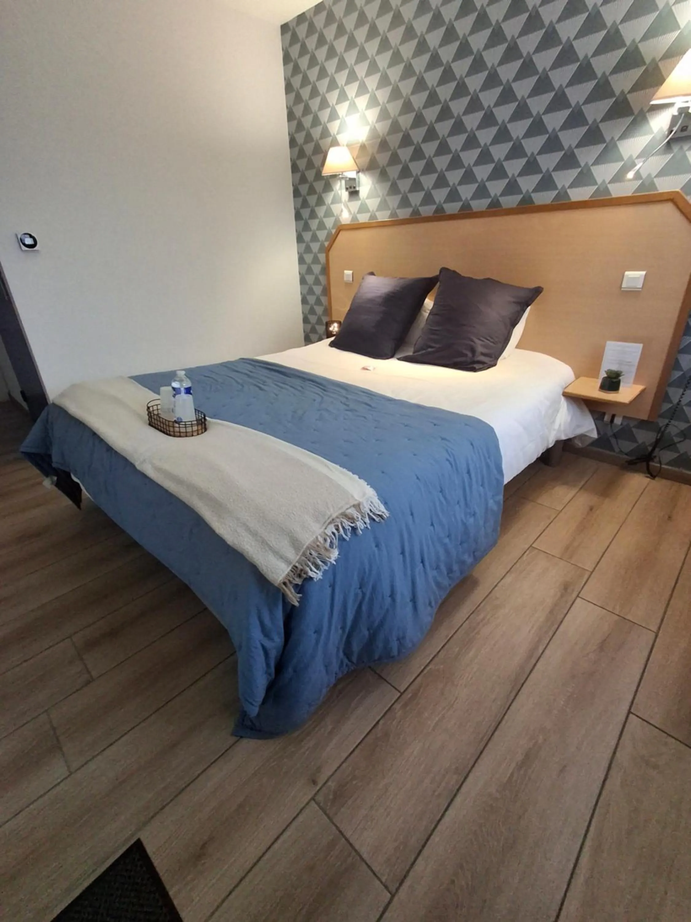 Bed in Hôtel Le Laury's