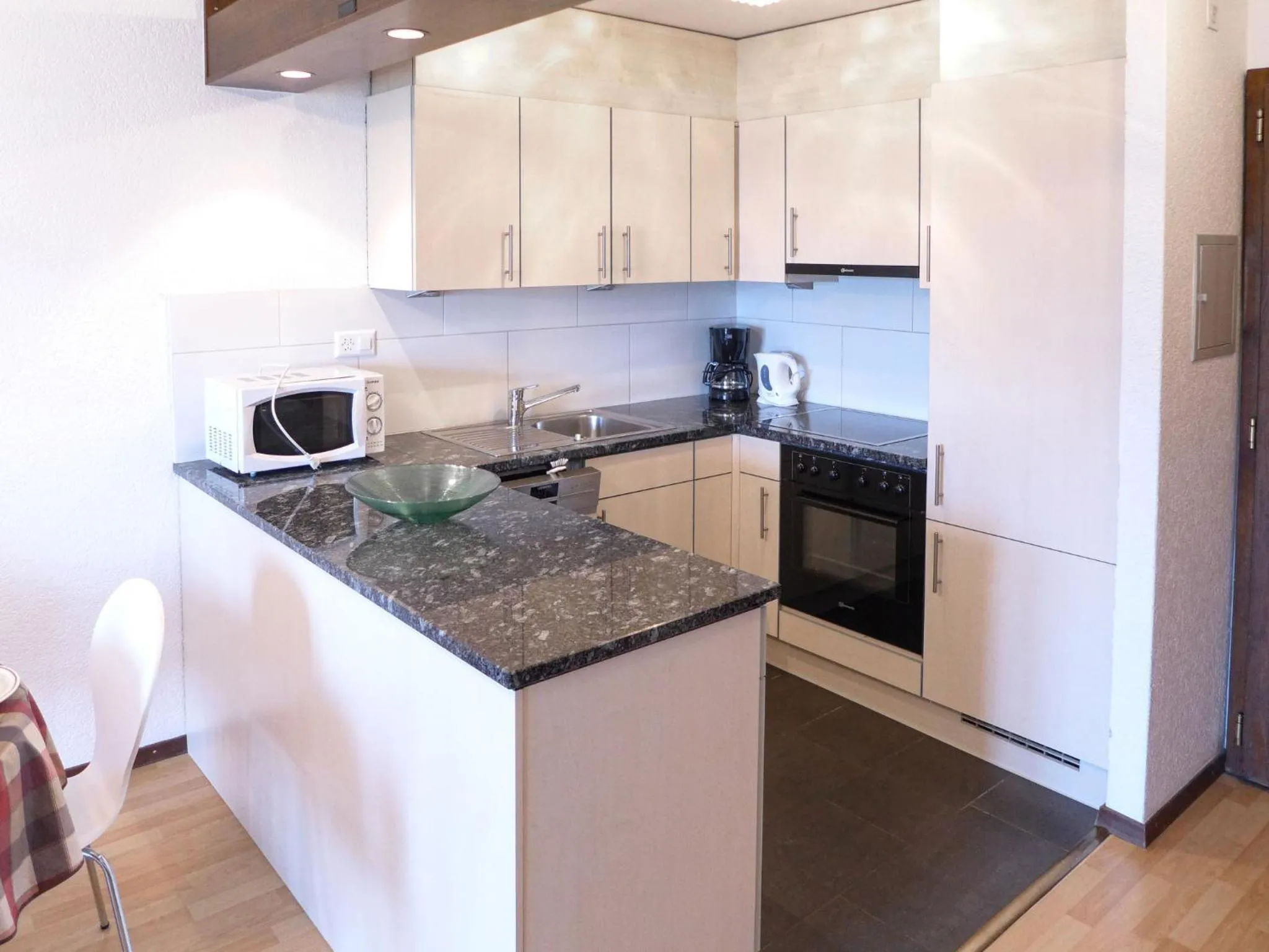 Kitchen or kitchenette in Apartment Victoria B 7 by Interhome