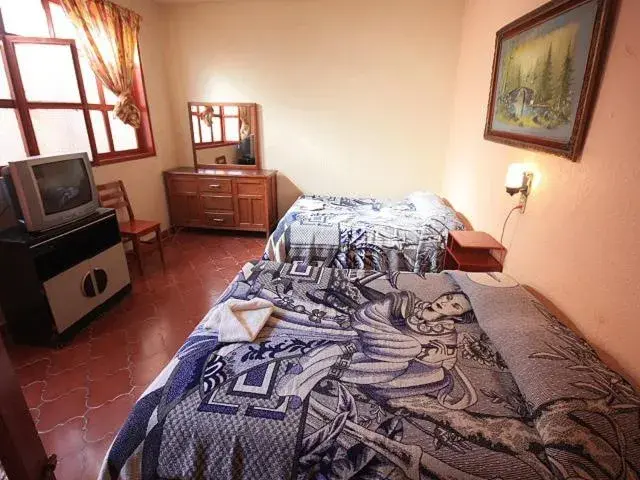 Classic Quadruple Room in Hotel San Martin Classic Quadruple Room in Hotel San Martin