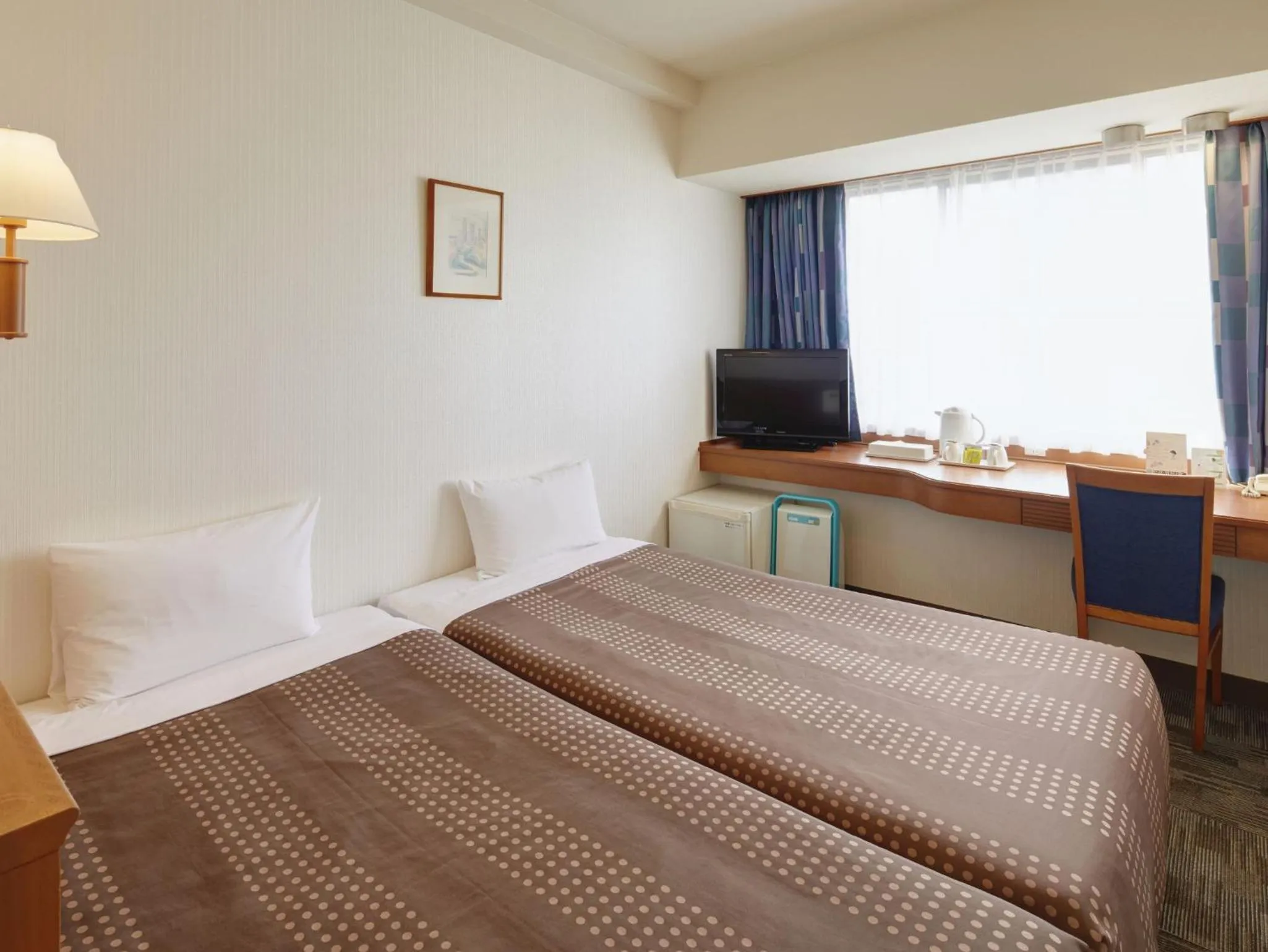 Photo of the whole room, Bed in Hotel Roco Inn Okinawa