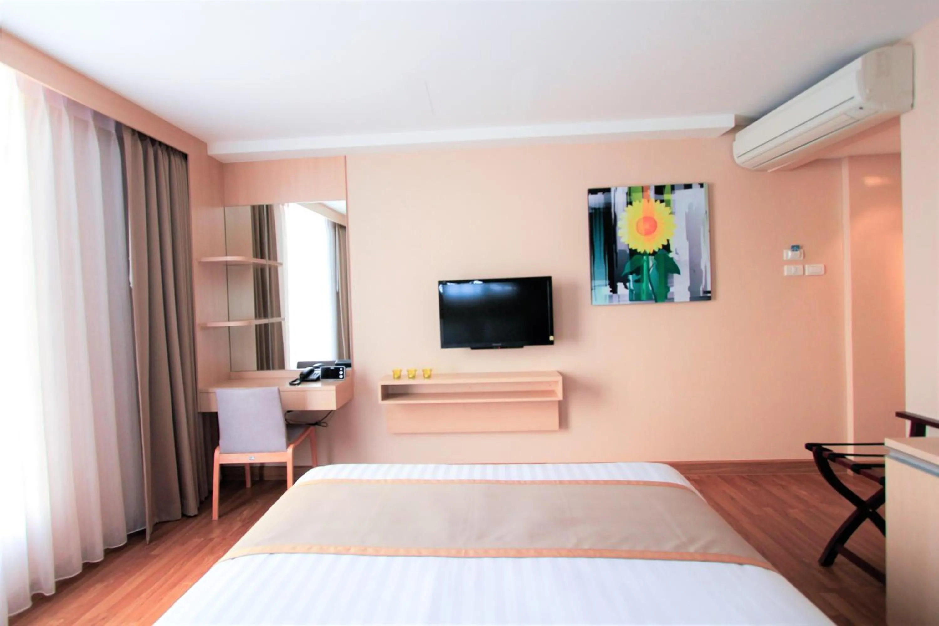 TV/Entertainment Center in Petals Inn