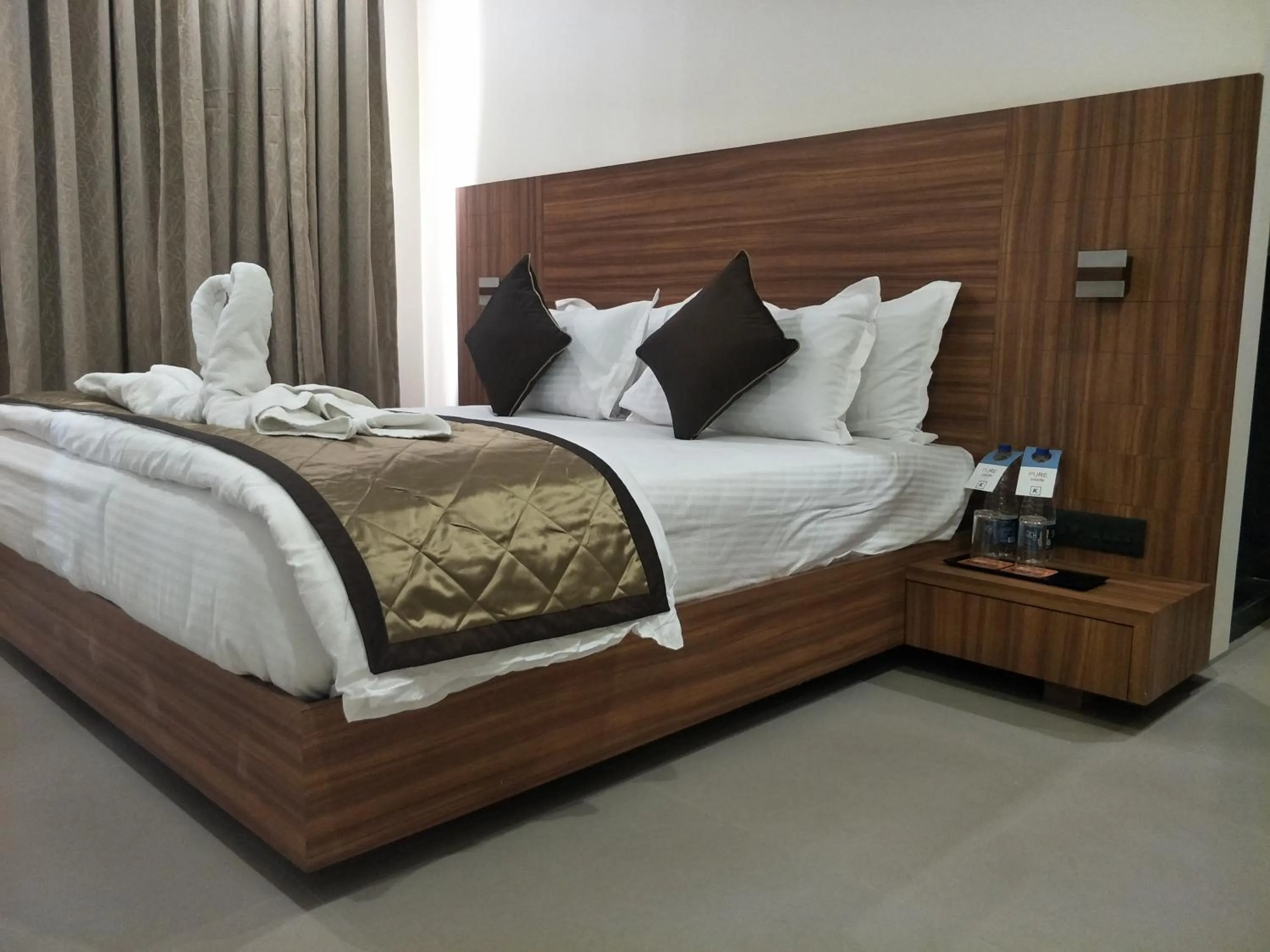 Bed in Kyriad Hotel Solapur by OTHPL