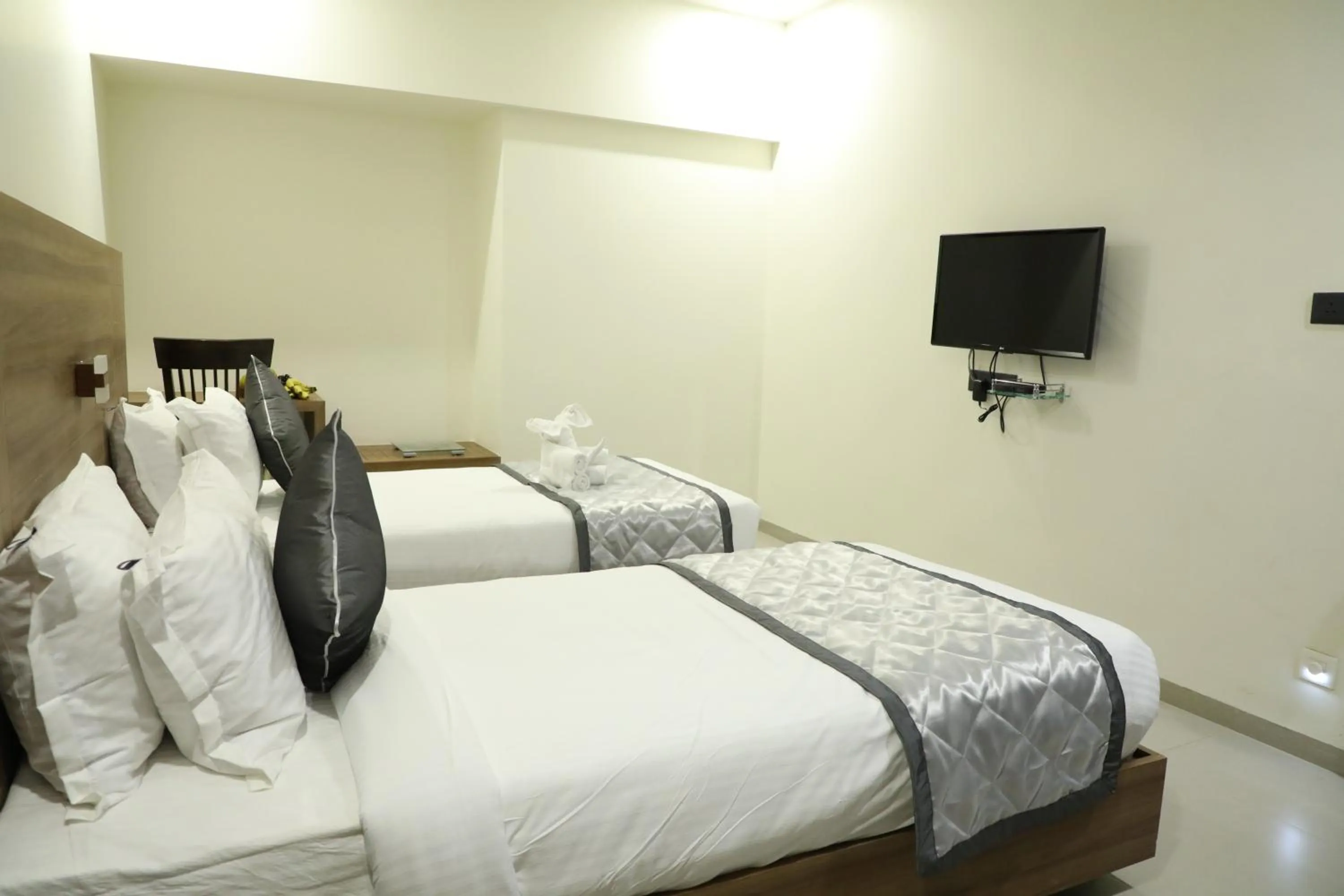 Bed in Kyriad Hotel Solapur by OTHPL