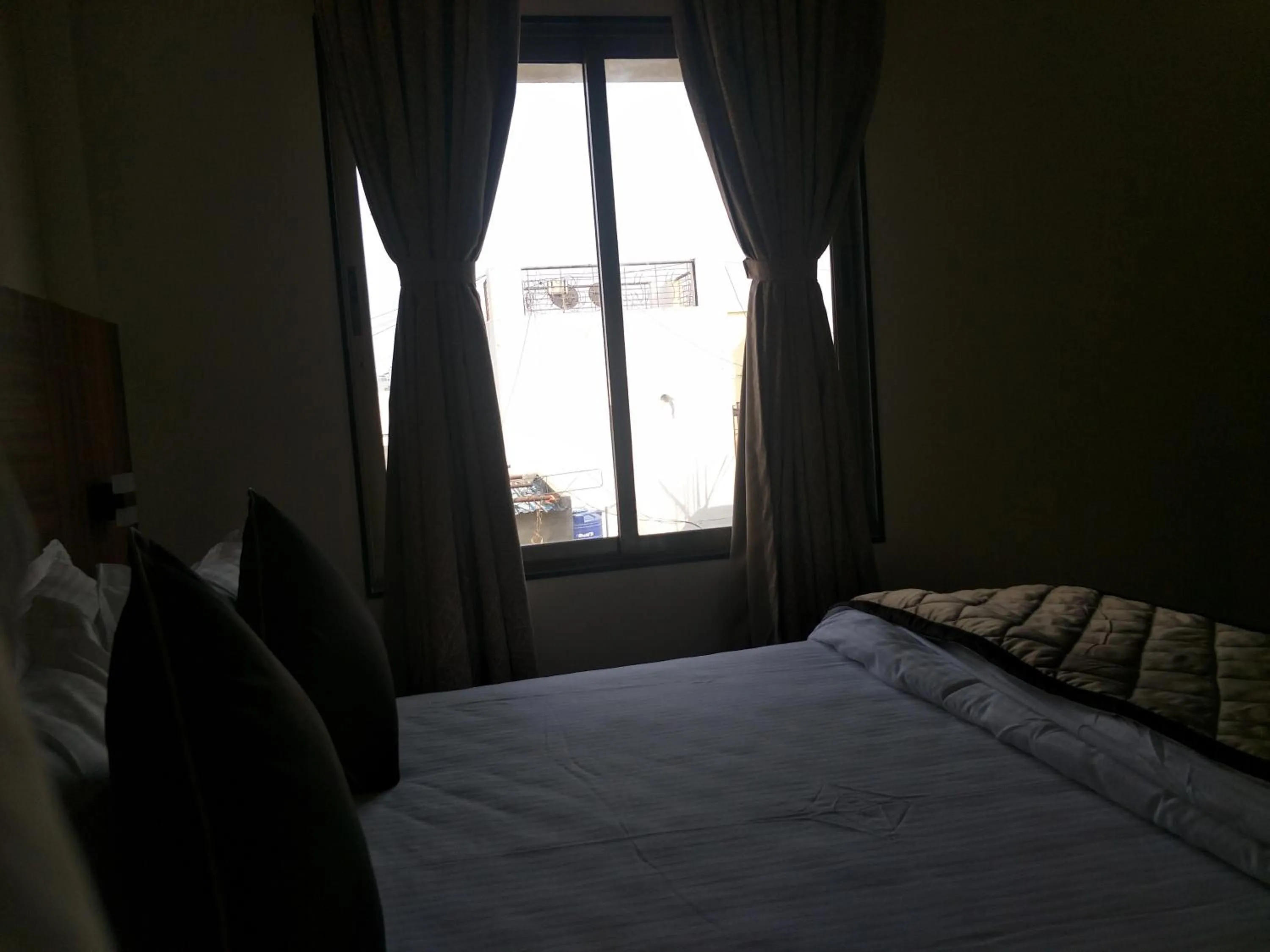 Bed in Kyriad Hotel Solapur by OTHPL