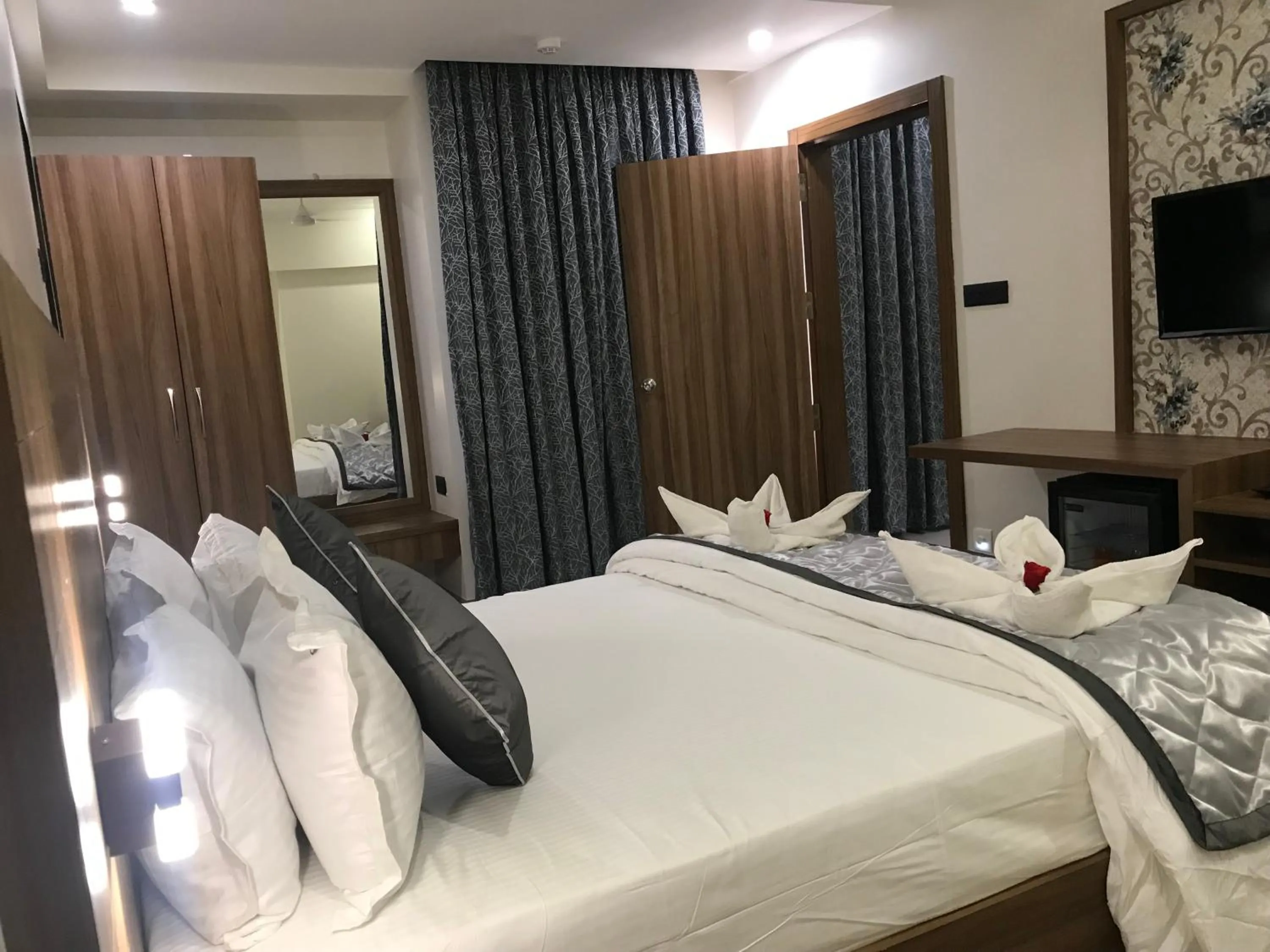 Bed in Kyriad Hotel Solapur by OTHPL