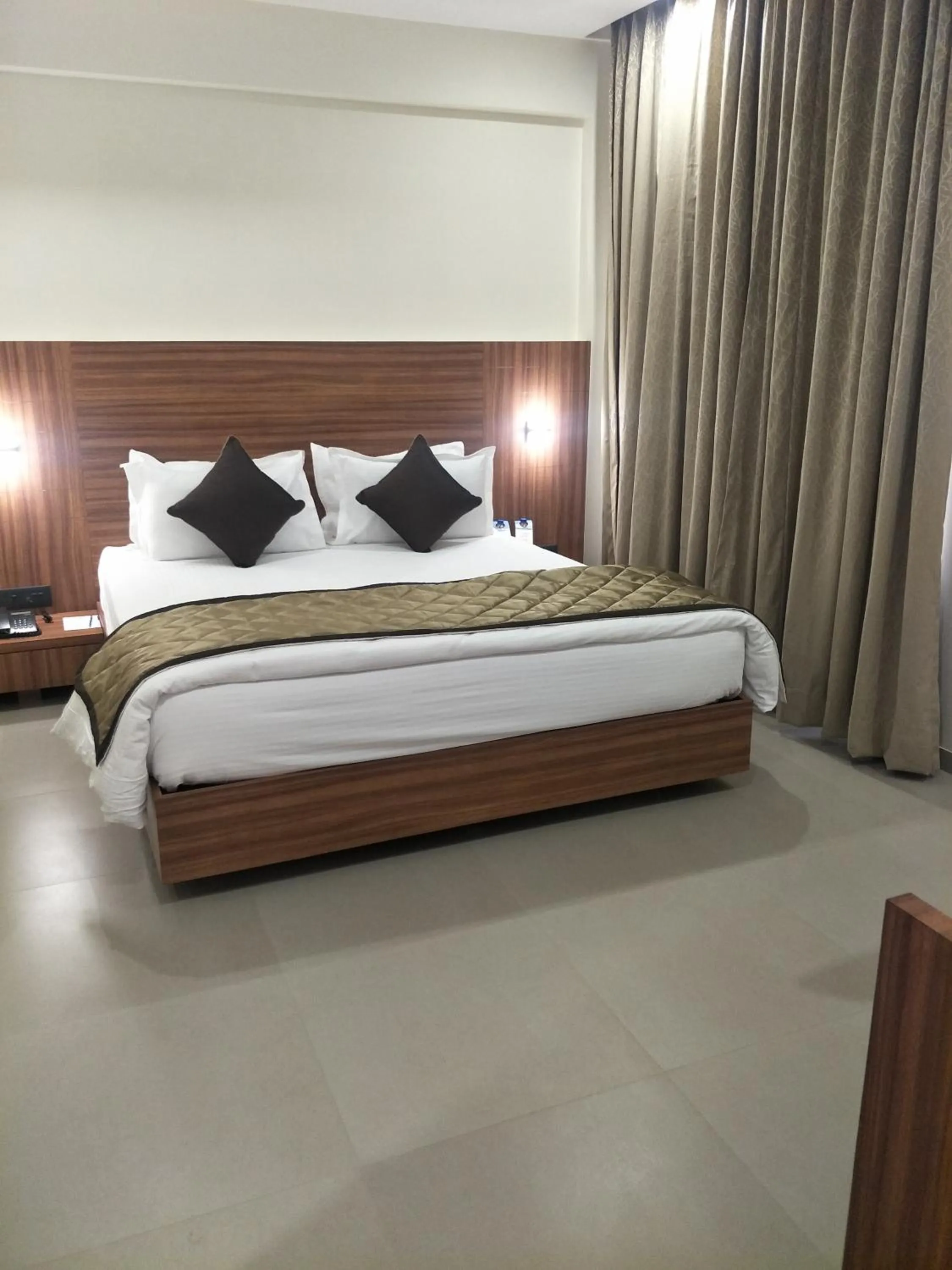 Bed in Kyriad Hotel Solapur by OTHPL