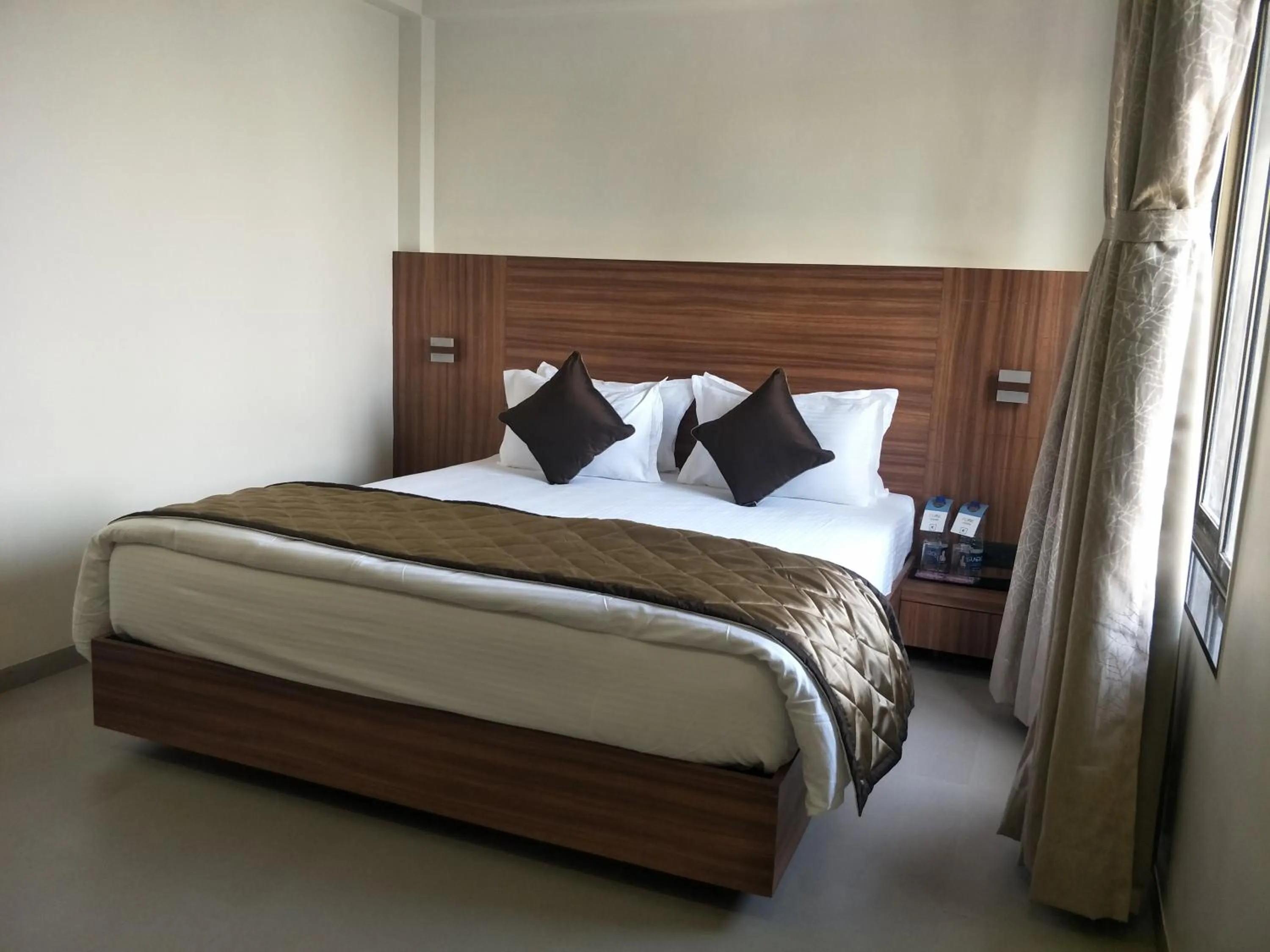 Bed in Kyriad Hotel Solapur by OTHPL