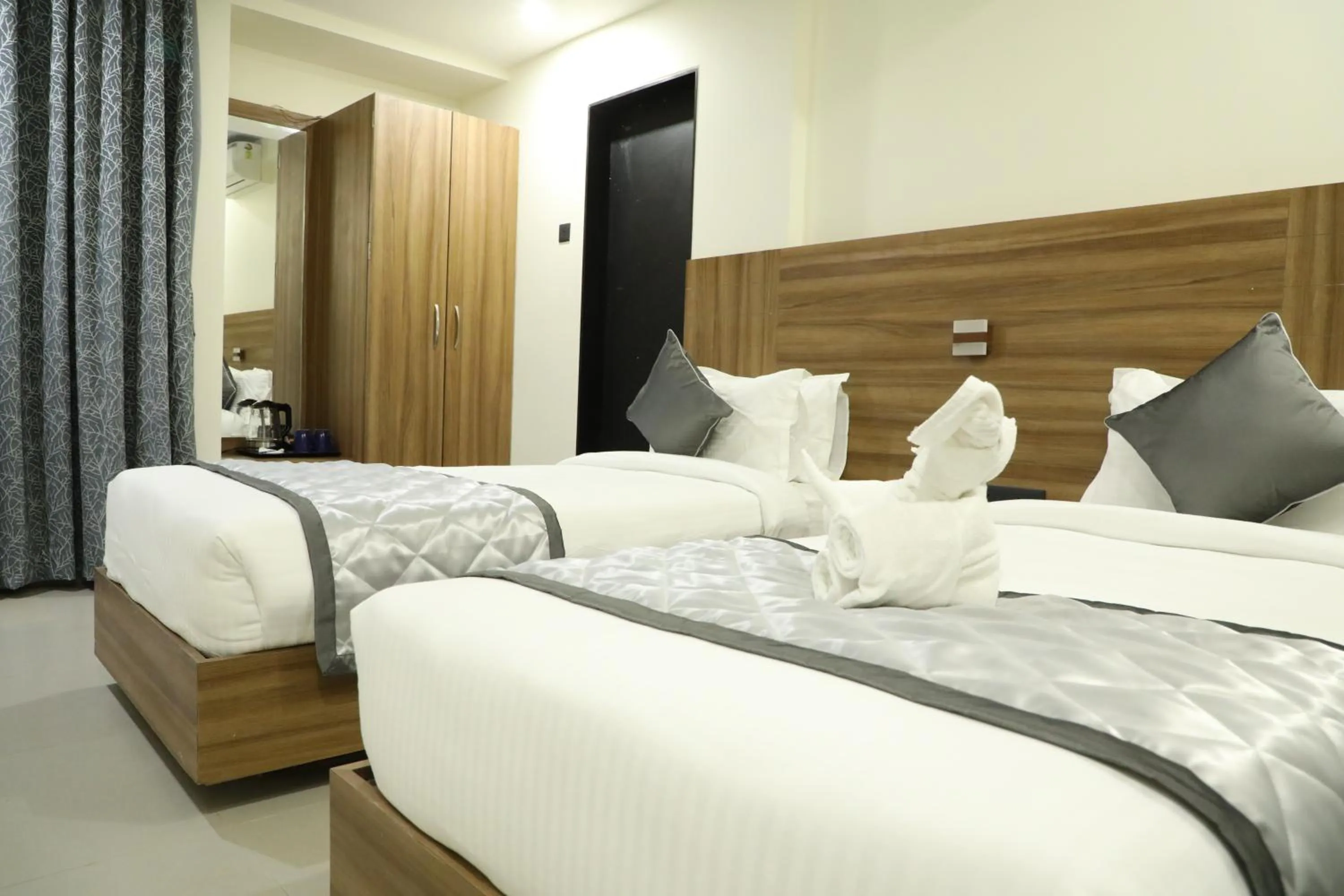 Bed in Kyriad Hotel Solapur by OTHPL