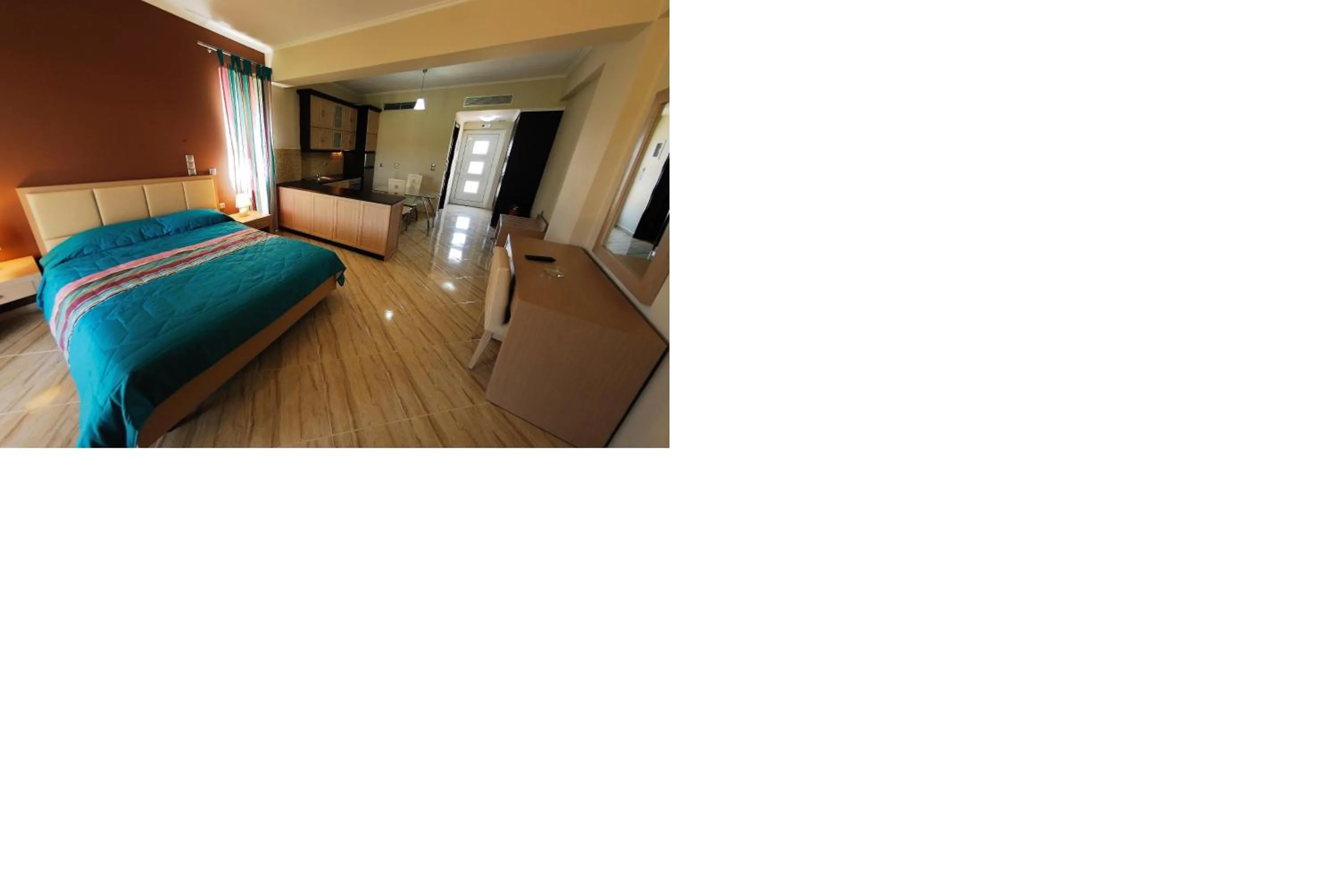 Bed in Antonios Village Hotel & Apartments