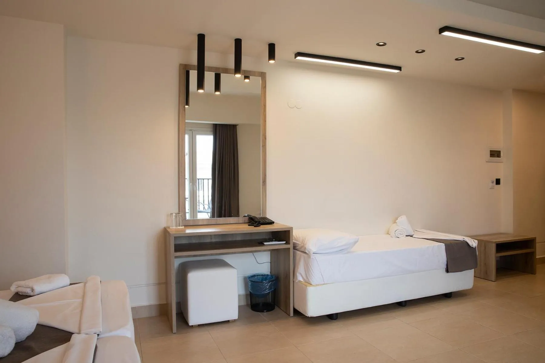 Bed in Dafni Plus Hotel