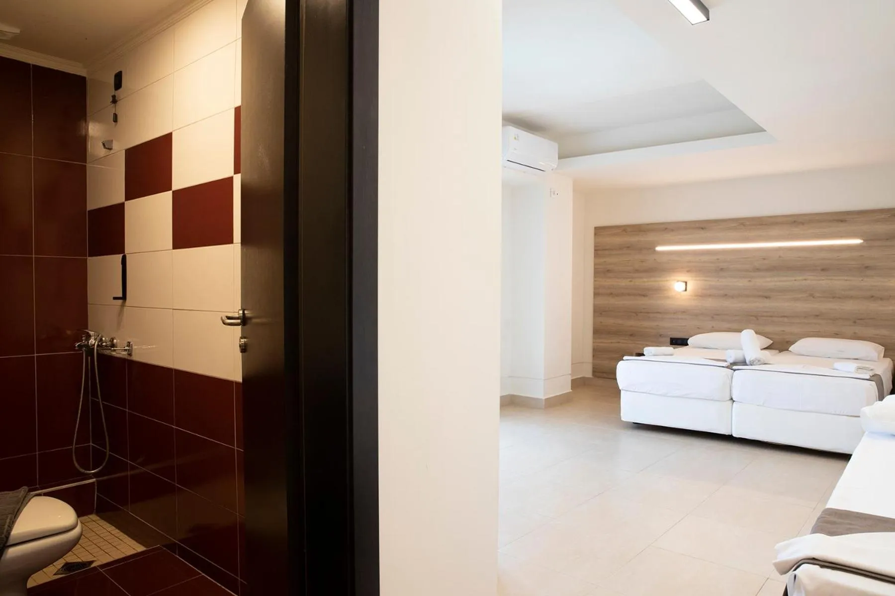 Bed in Dafni Plus Hotel