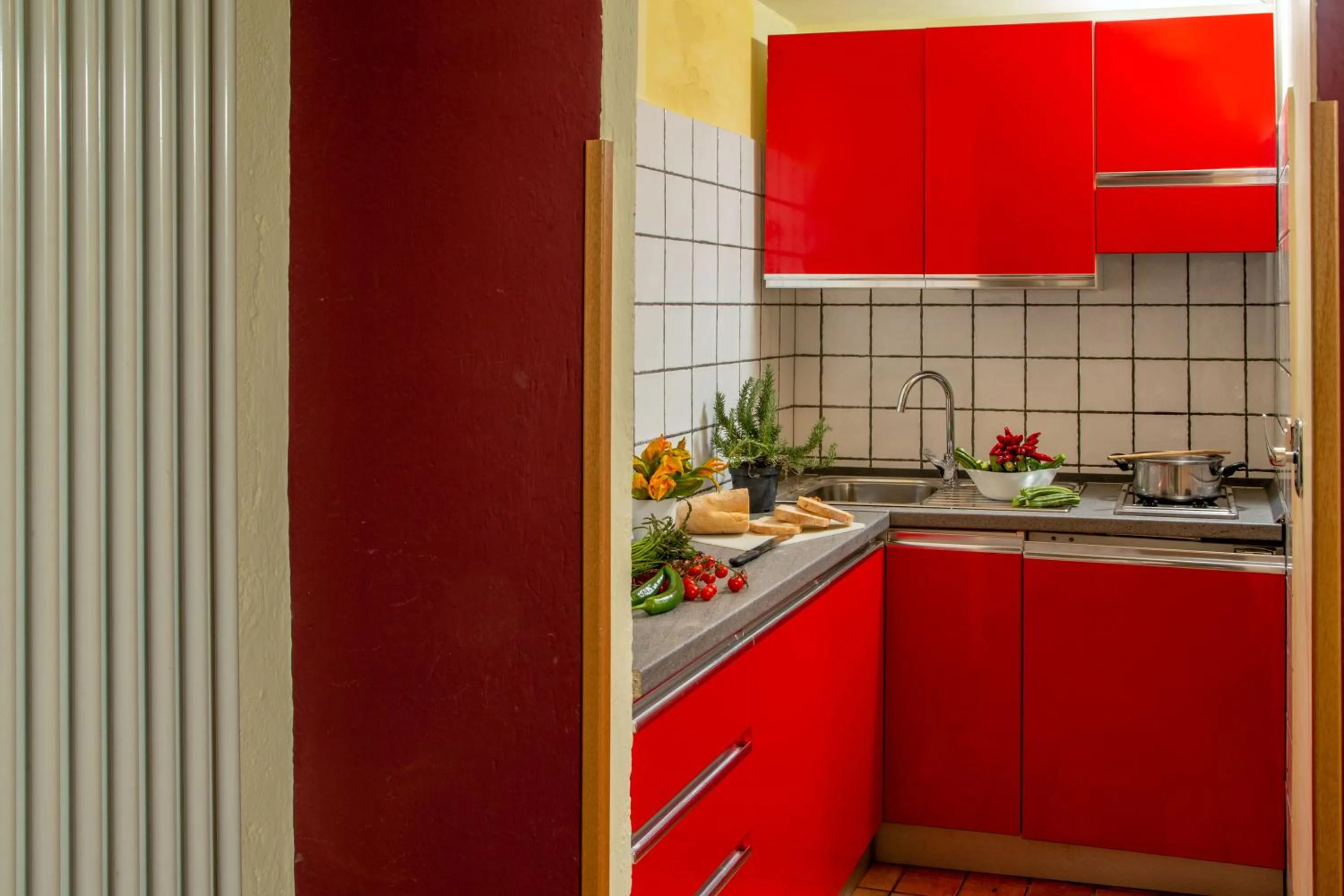 Kitchen or kitchenette in Bollo Apartments