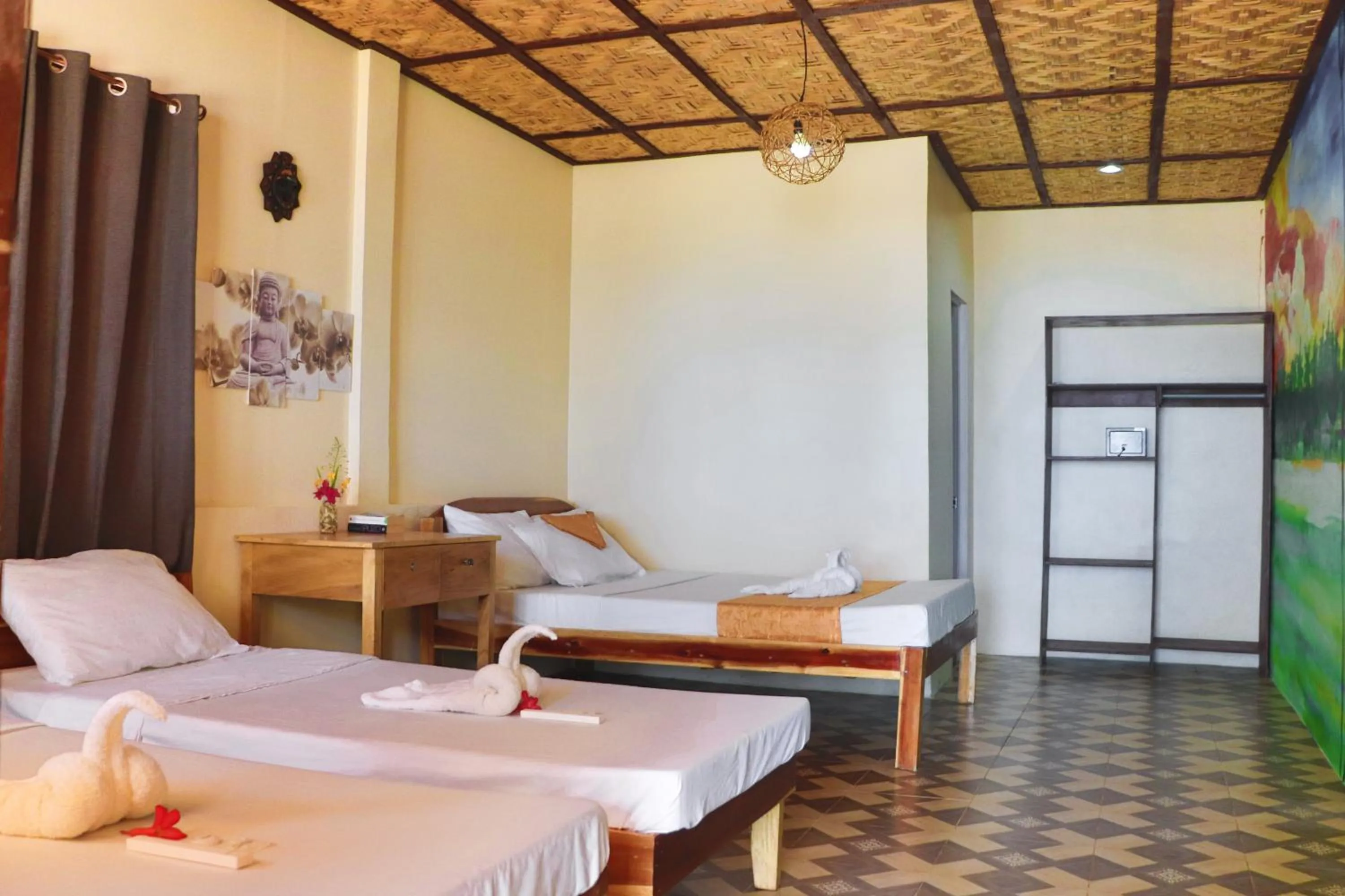 Bed in Mecaja Beach House