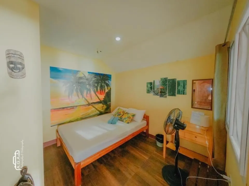 Bed in Mecaja Beach House