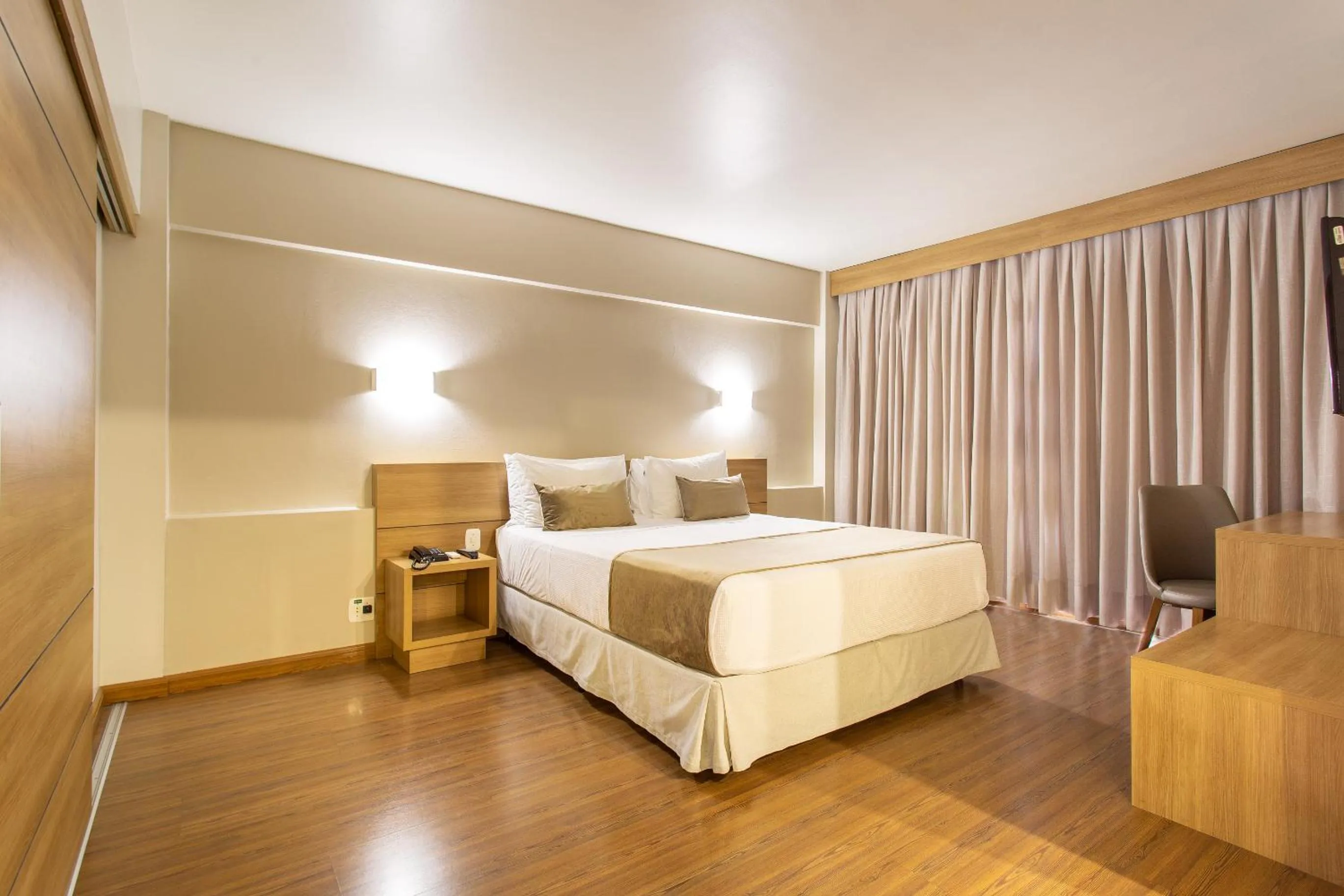 Bed in Jandaia Turismo Hotel