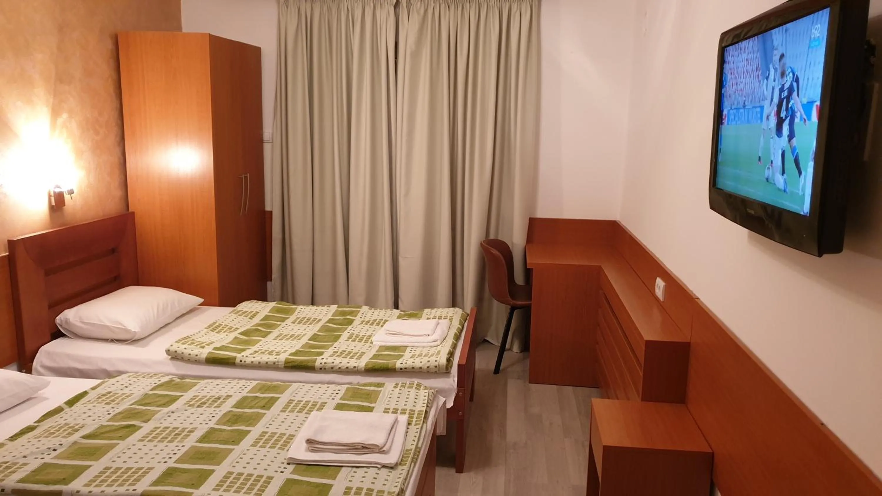 Bed in Guest House Boska