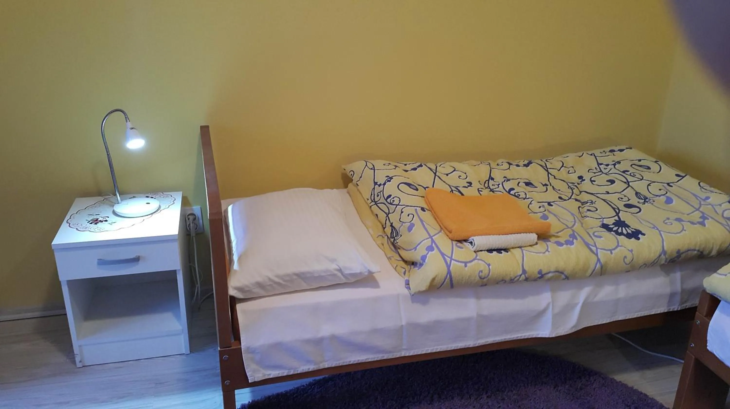 Bed in Guest House Boska