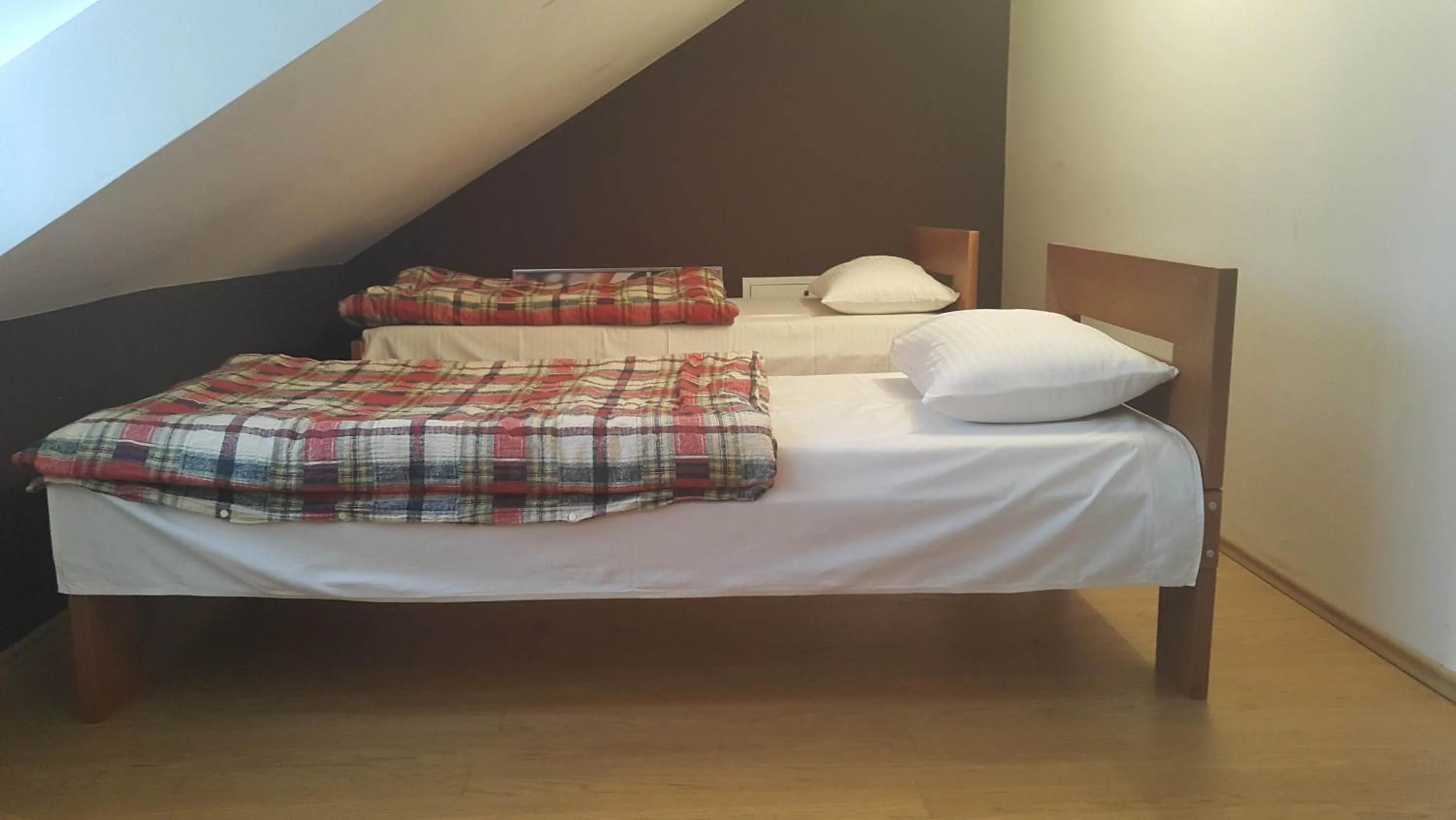 Bed in Guest House Boska