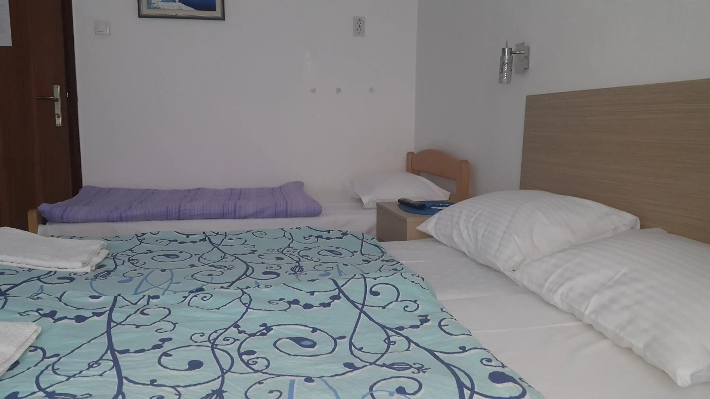 Bed in Guest House Boska