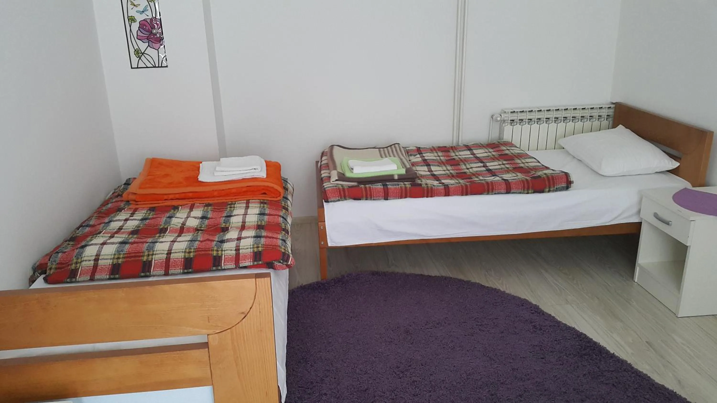 Bed in Guest House Boska