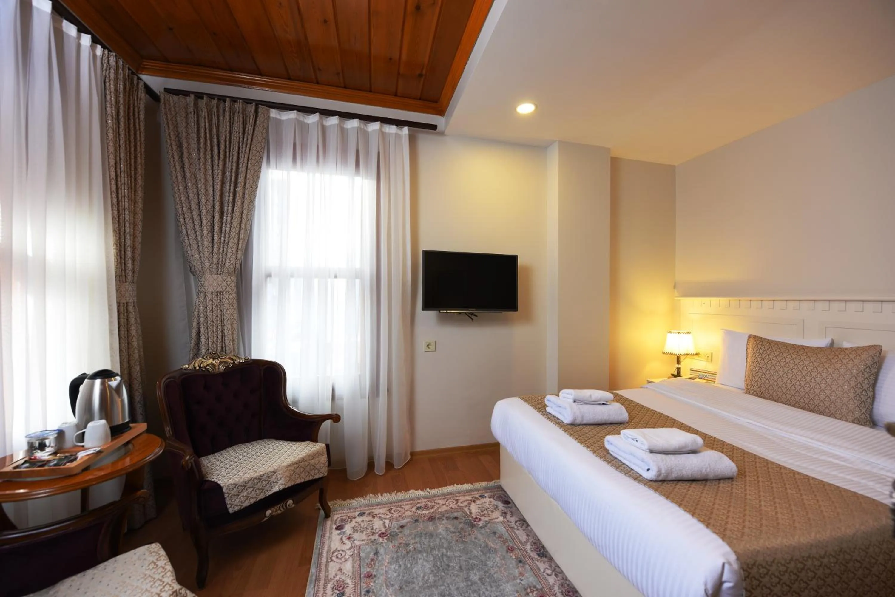 Bedroom, Bed in Elyka Hotel